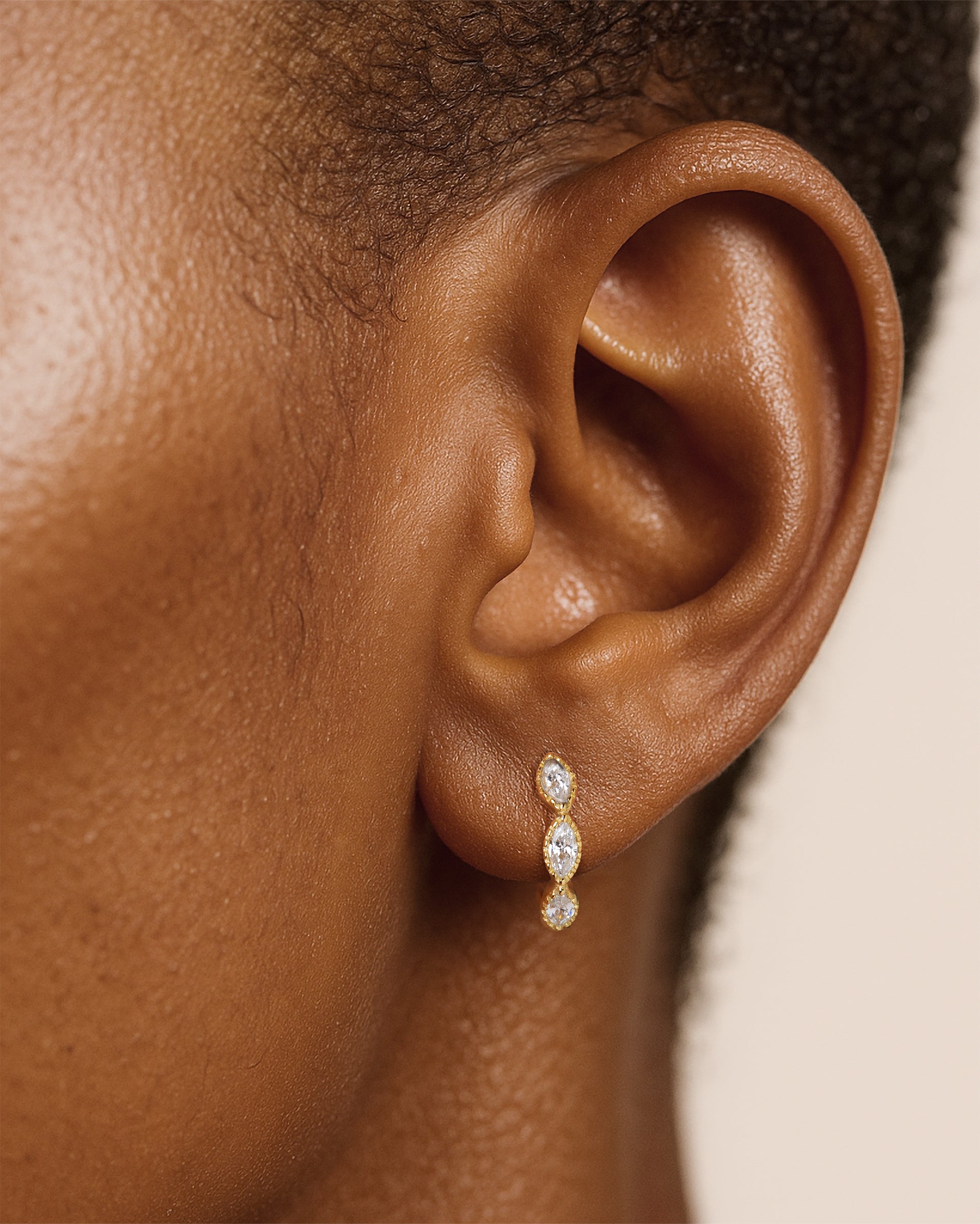 Marquise Huggie Hoops in Gold — alternate view