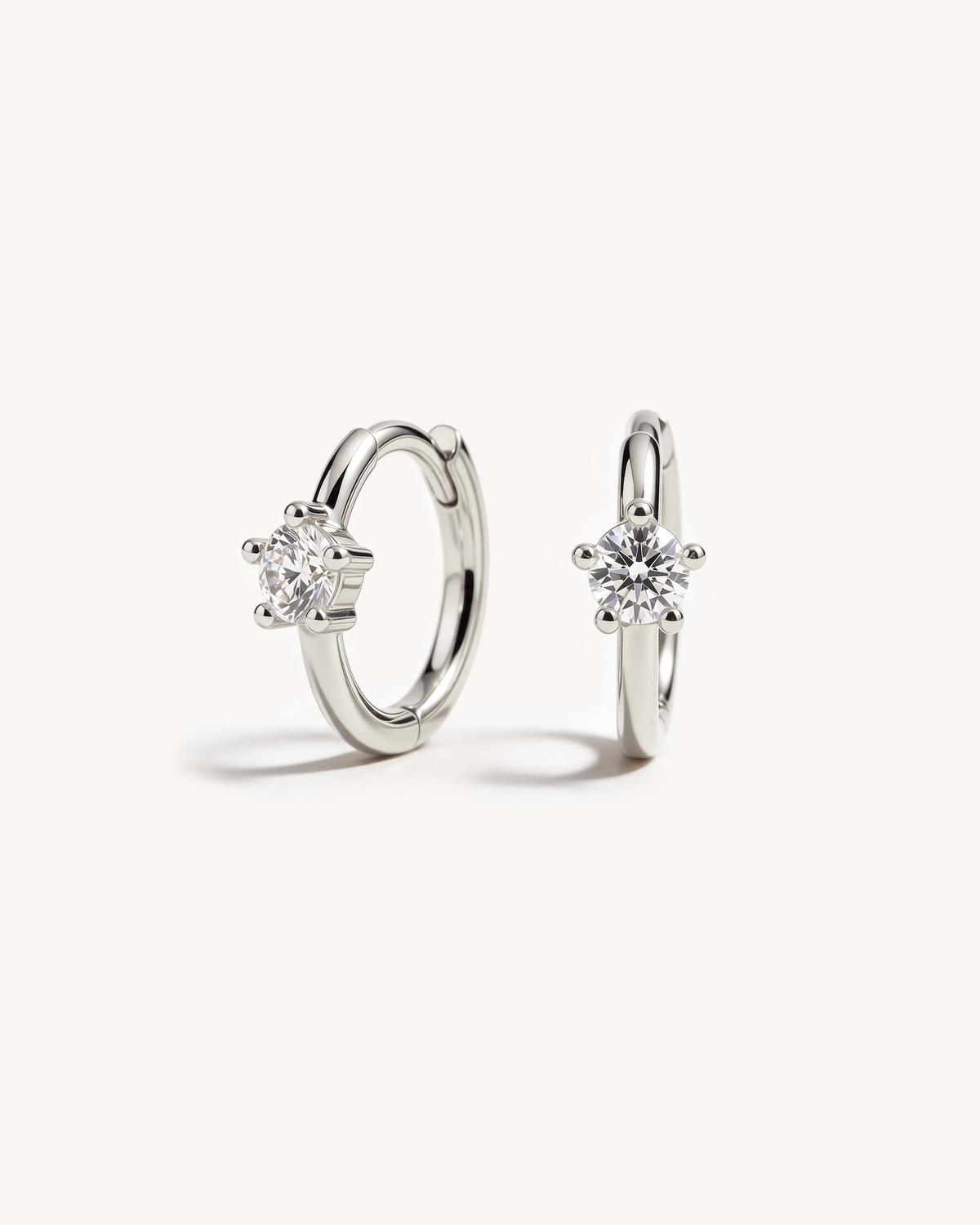 Solitaire Huggie Hoops in Silver