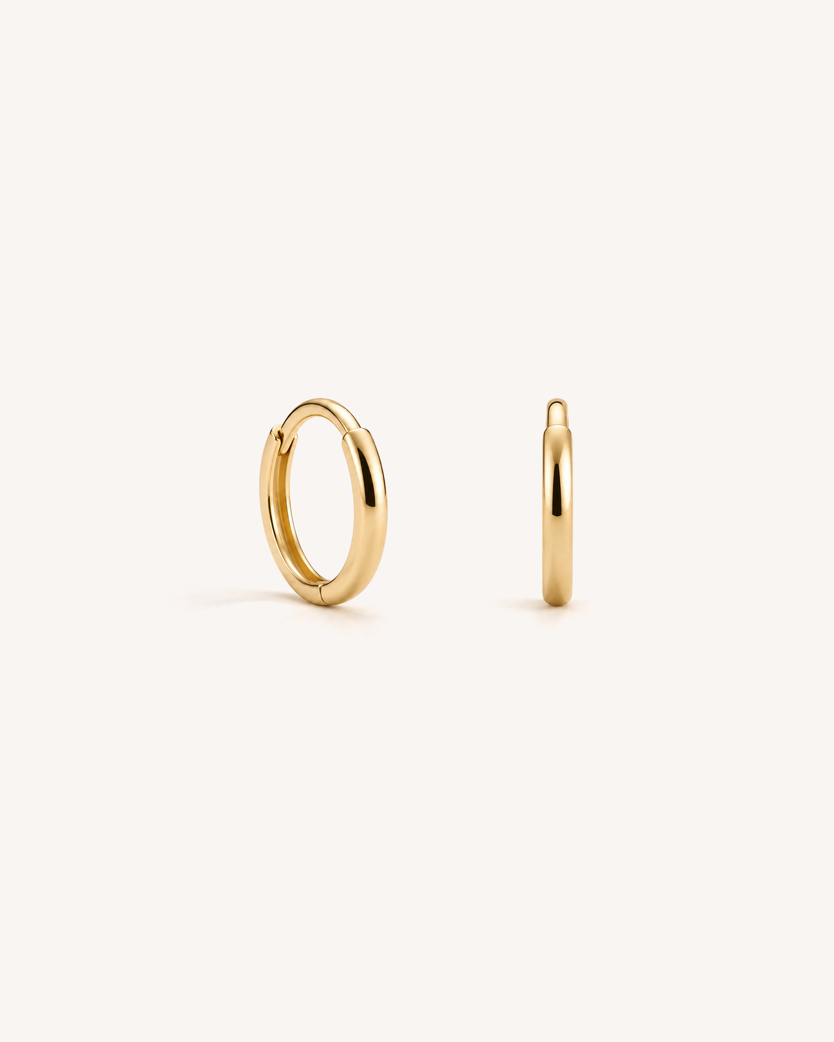 Thin Huggie Hoops in Gold
