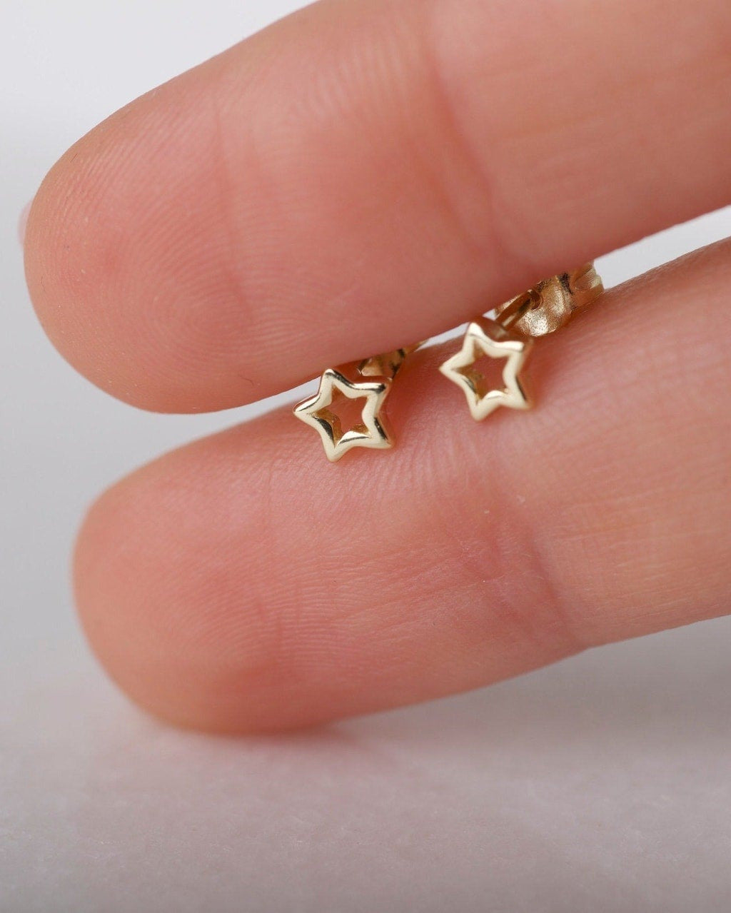 Mini Star Studs in Gold — alternate view