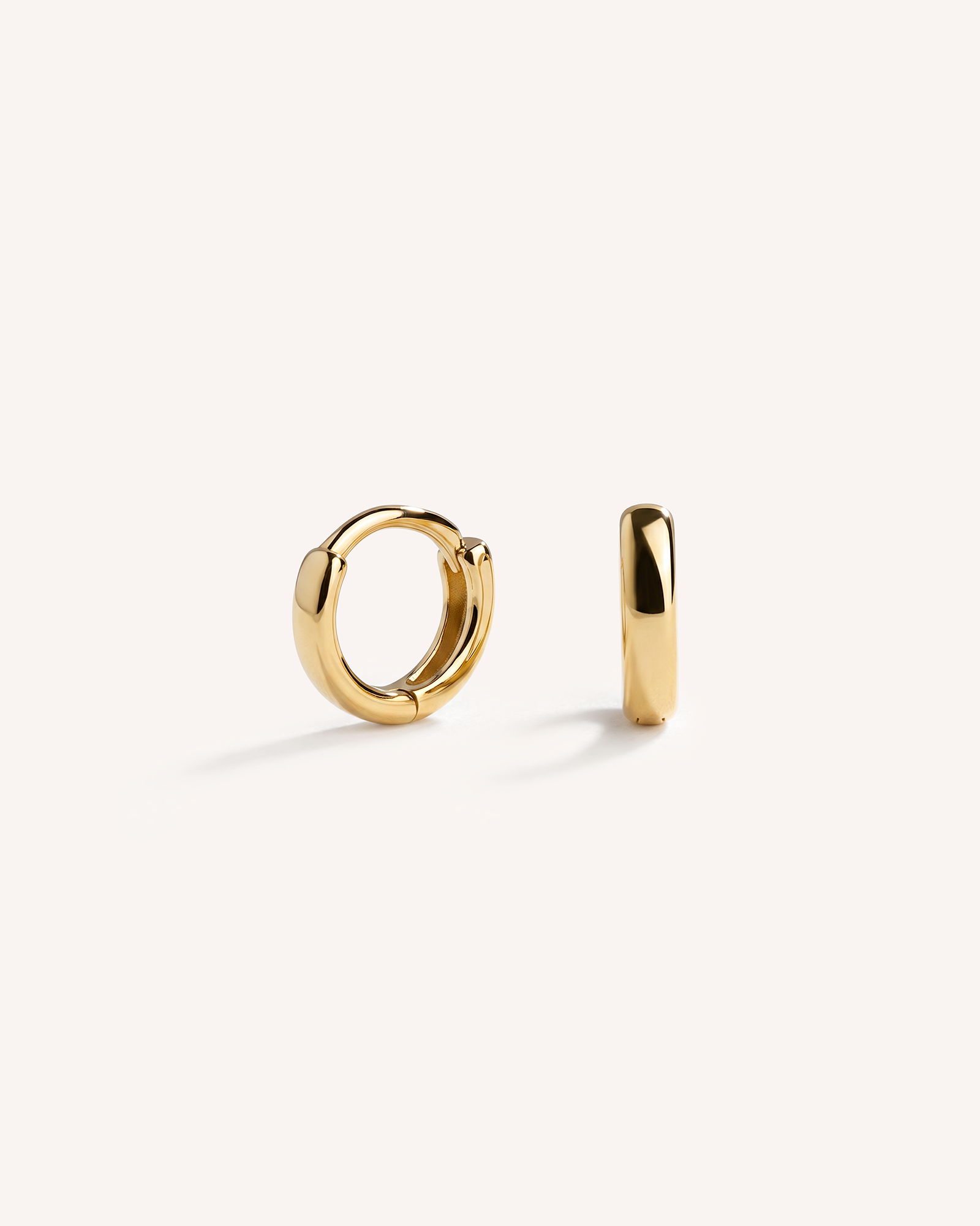 Mini Huggie Hoops in Gold