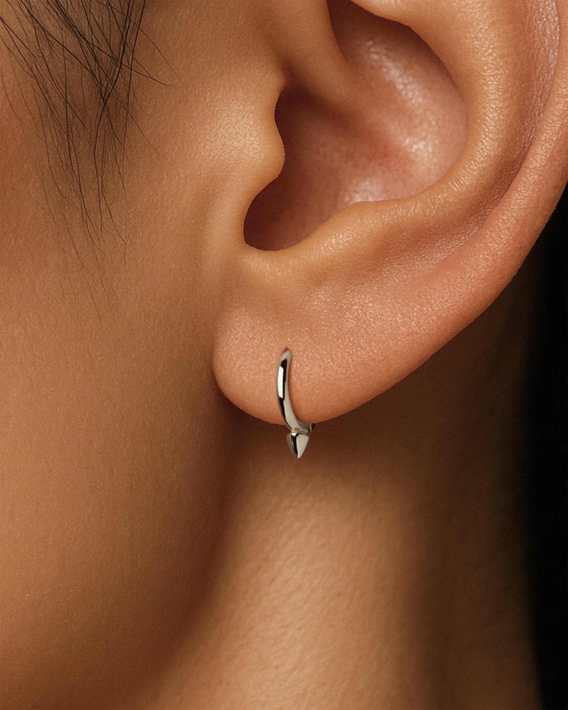Mini Spike Huggie Hoops in Silver — alternate view