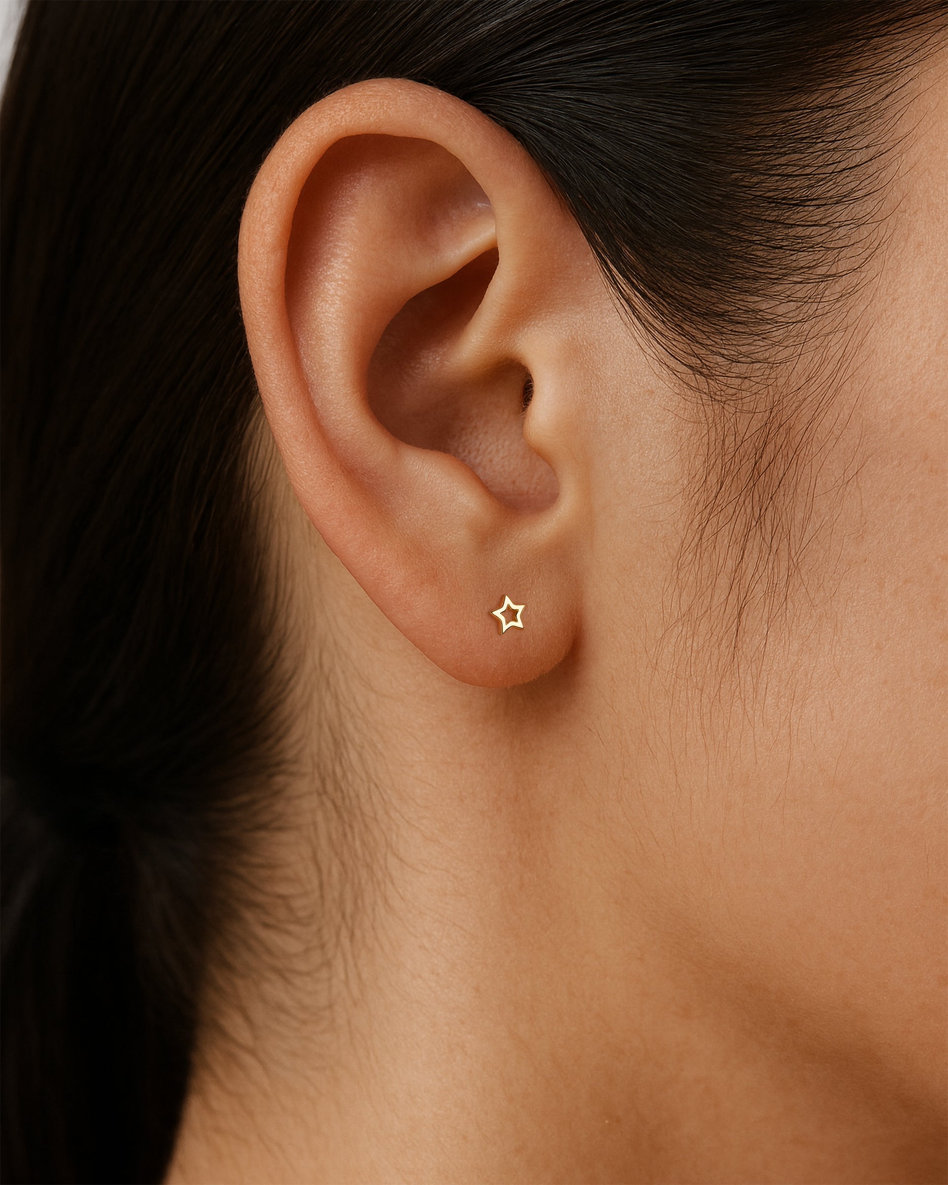 Mini Star Studs in Gold — alternate view