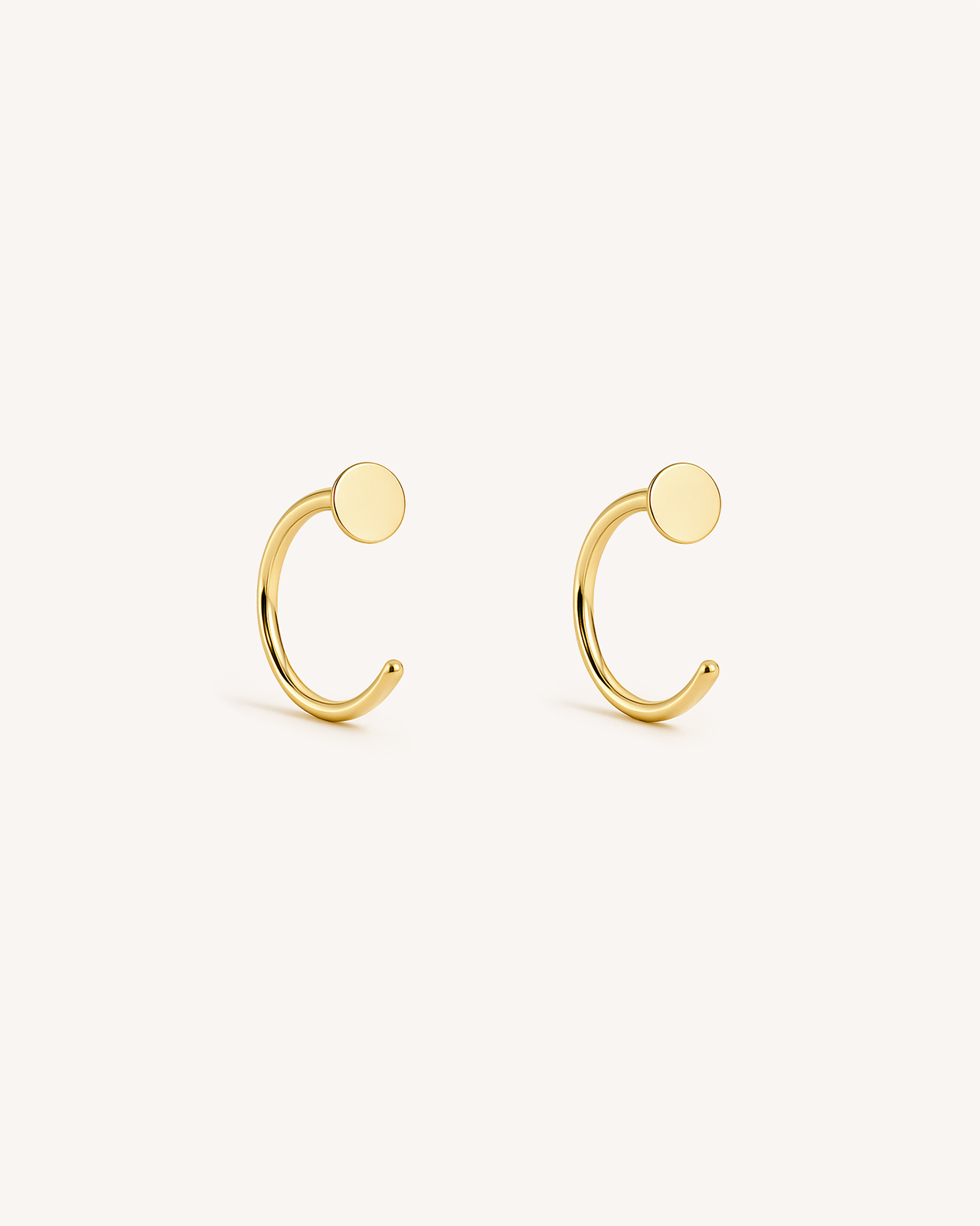 Open Disc Huggie Earrings in Gold