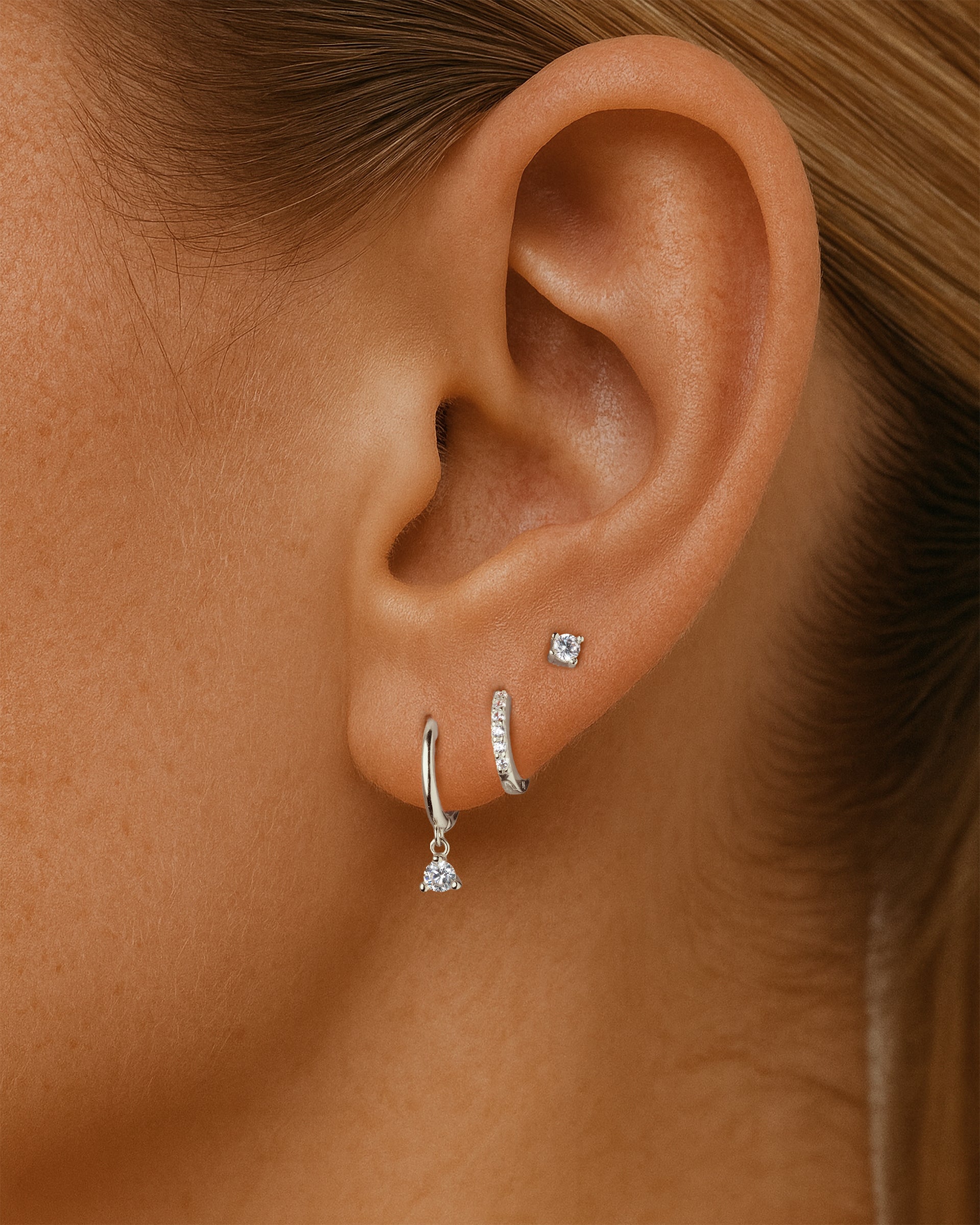 Solitaire Dangle Huggie Hoops in Silver — alternate view
