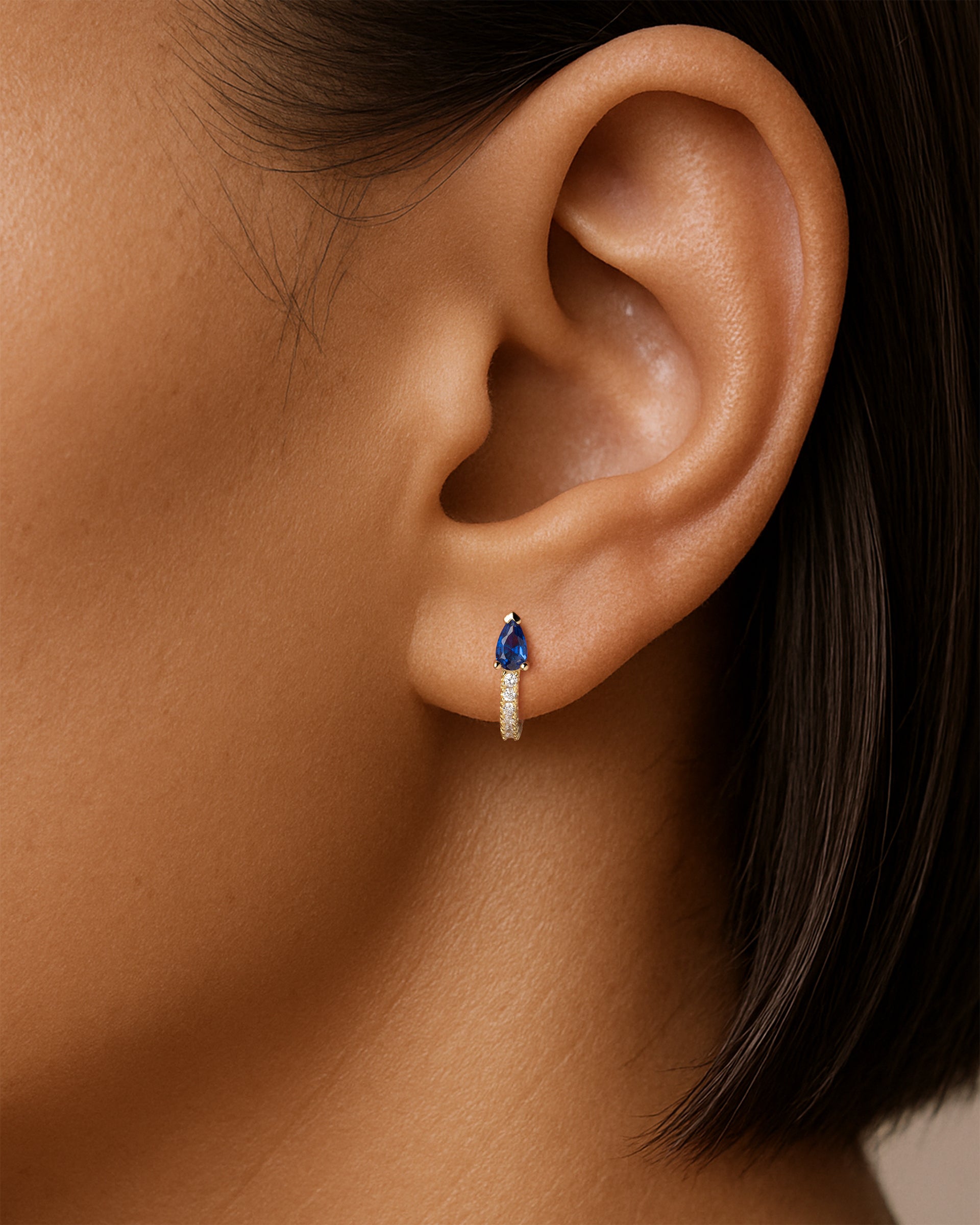 Teardrop Pave Huggie Hoops in Gold — Sapphire — alternate view