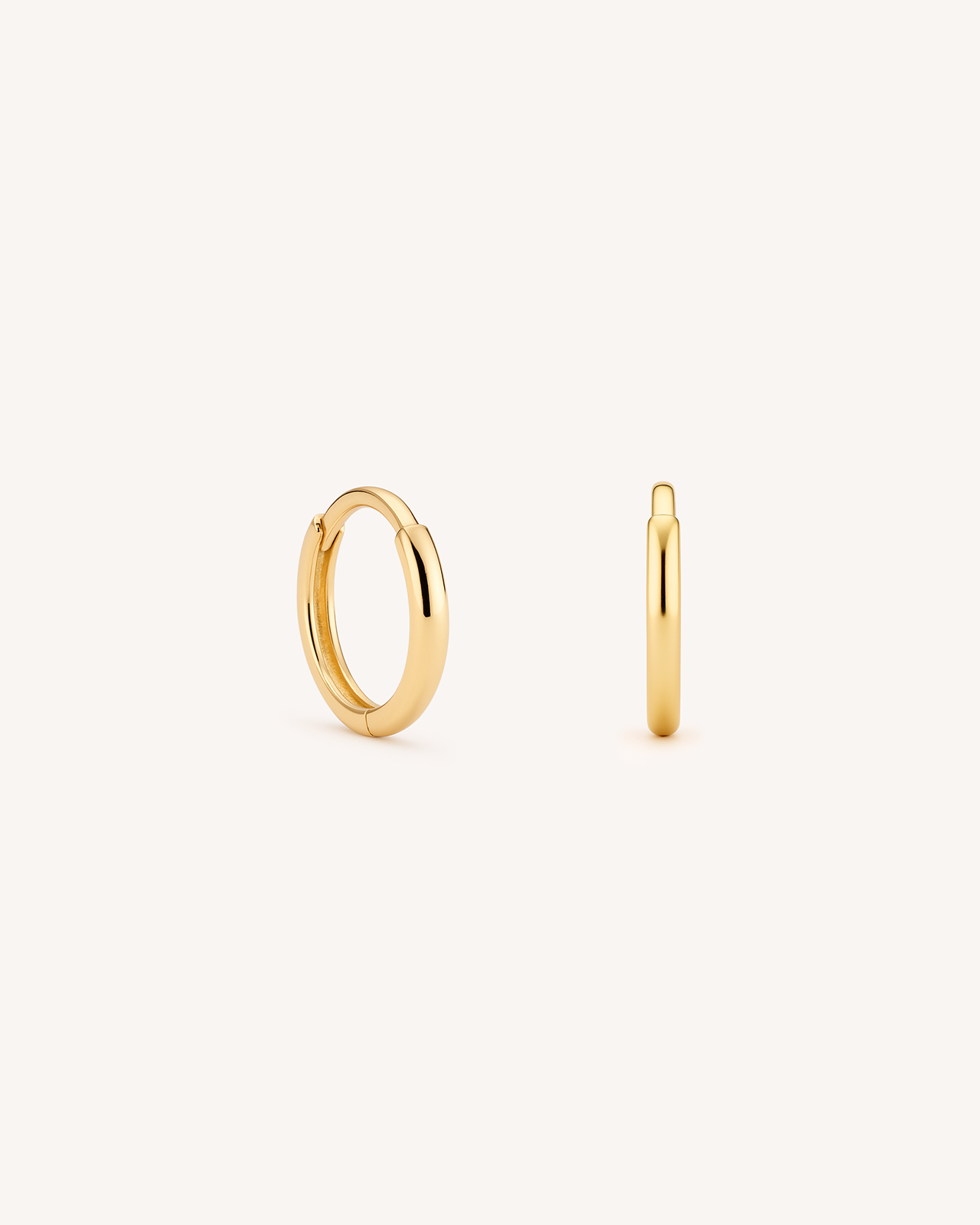 Thin Huggie Hoops in Gold