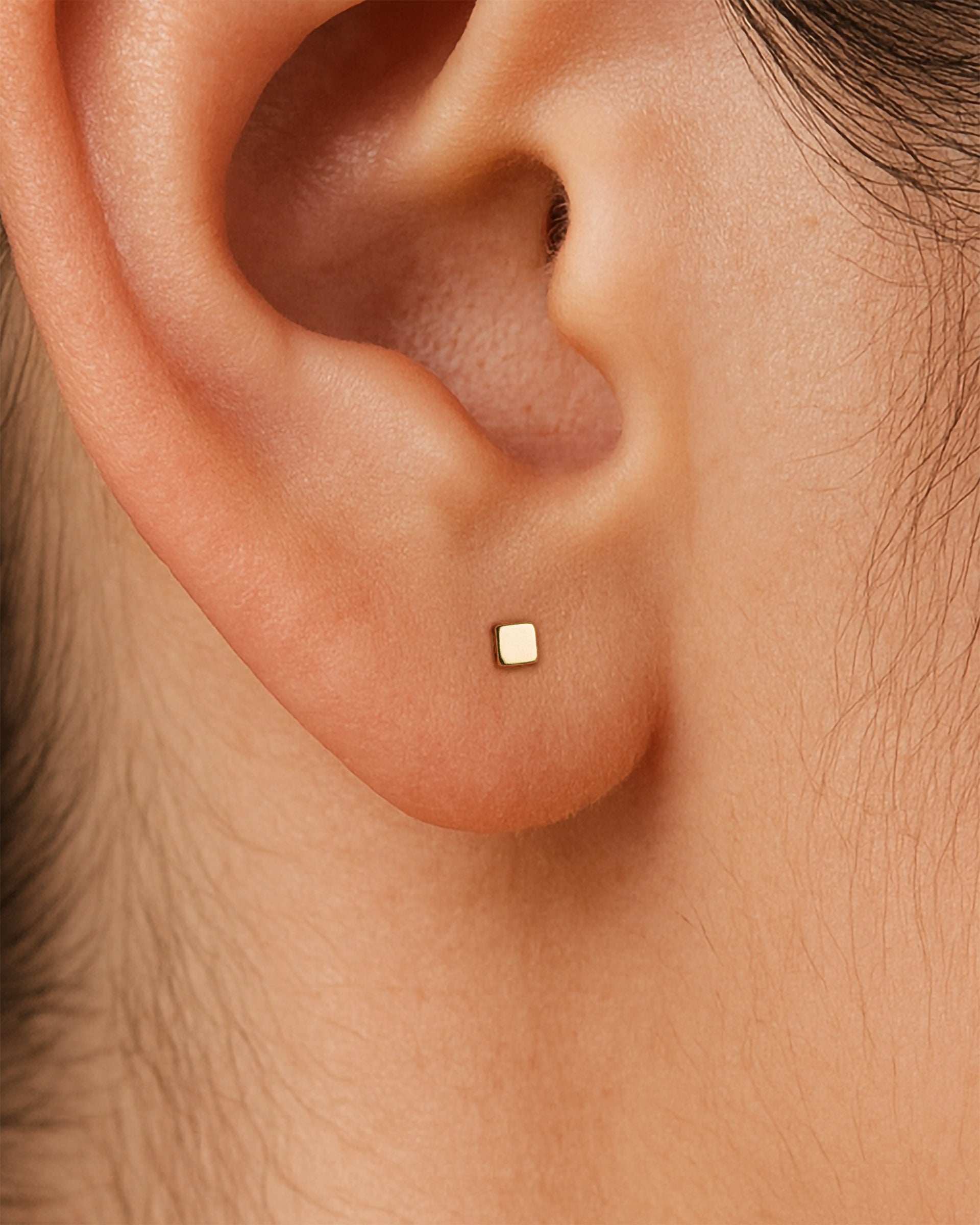Tiny Square Studs in Gold — alternate view