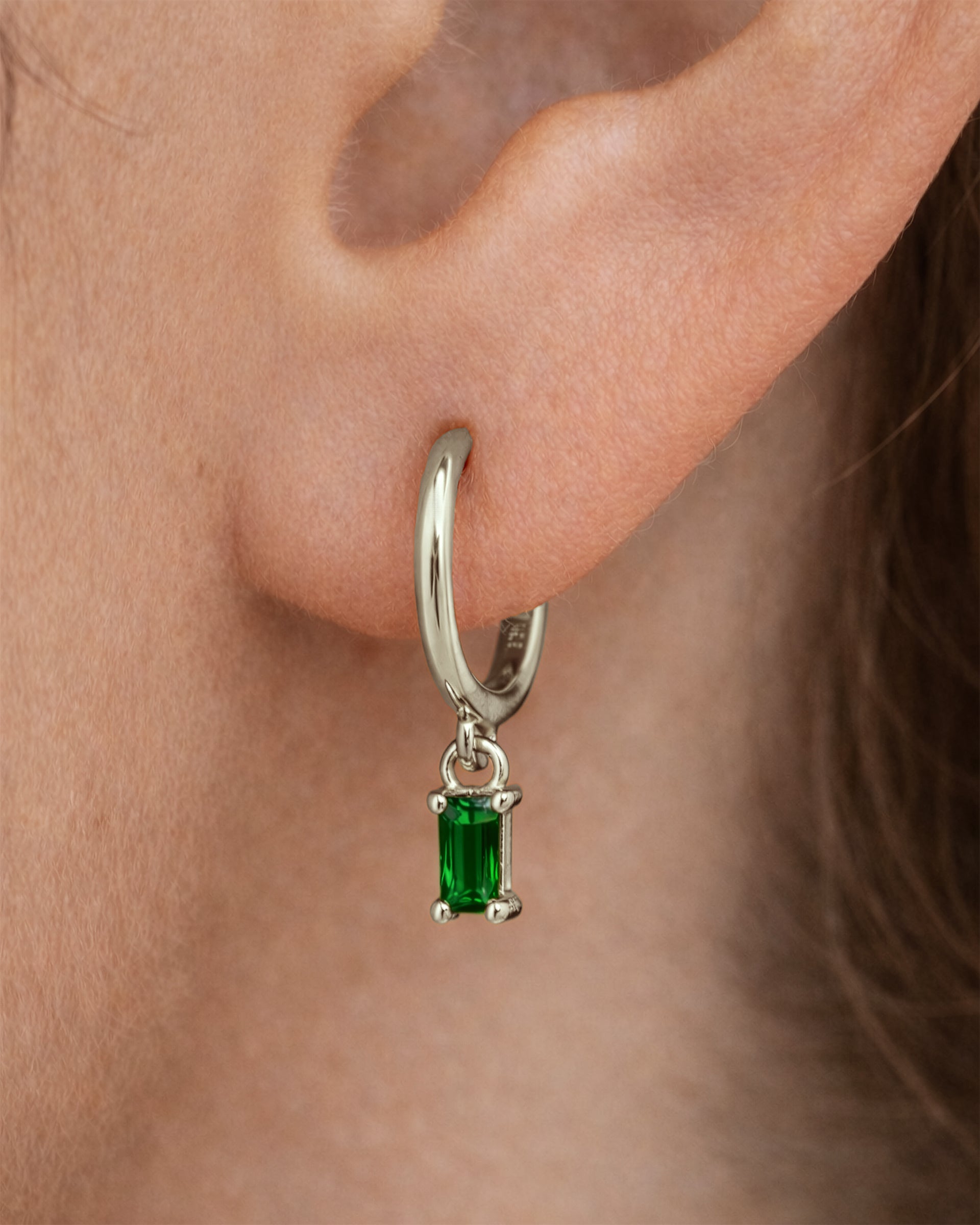 Dangle Baguette Huggie Hoops in Silver — Emerald — alternate view