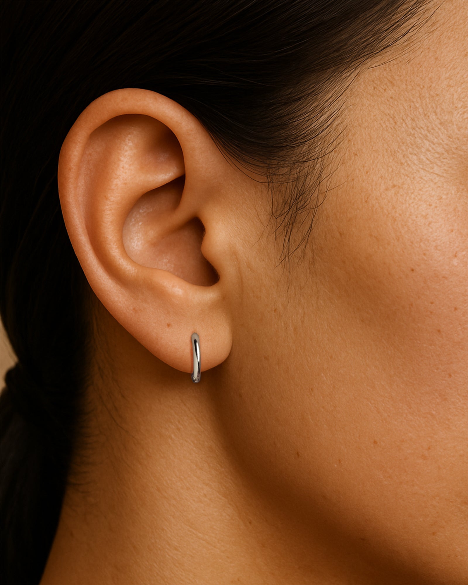 Classic Huggie Hoops in Silver — alternate view