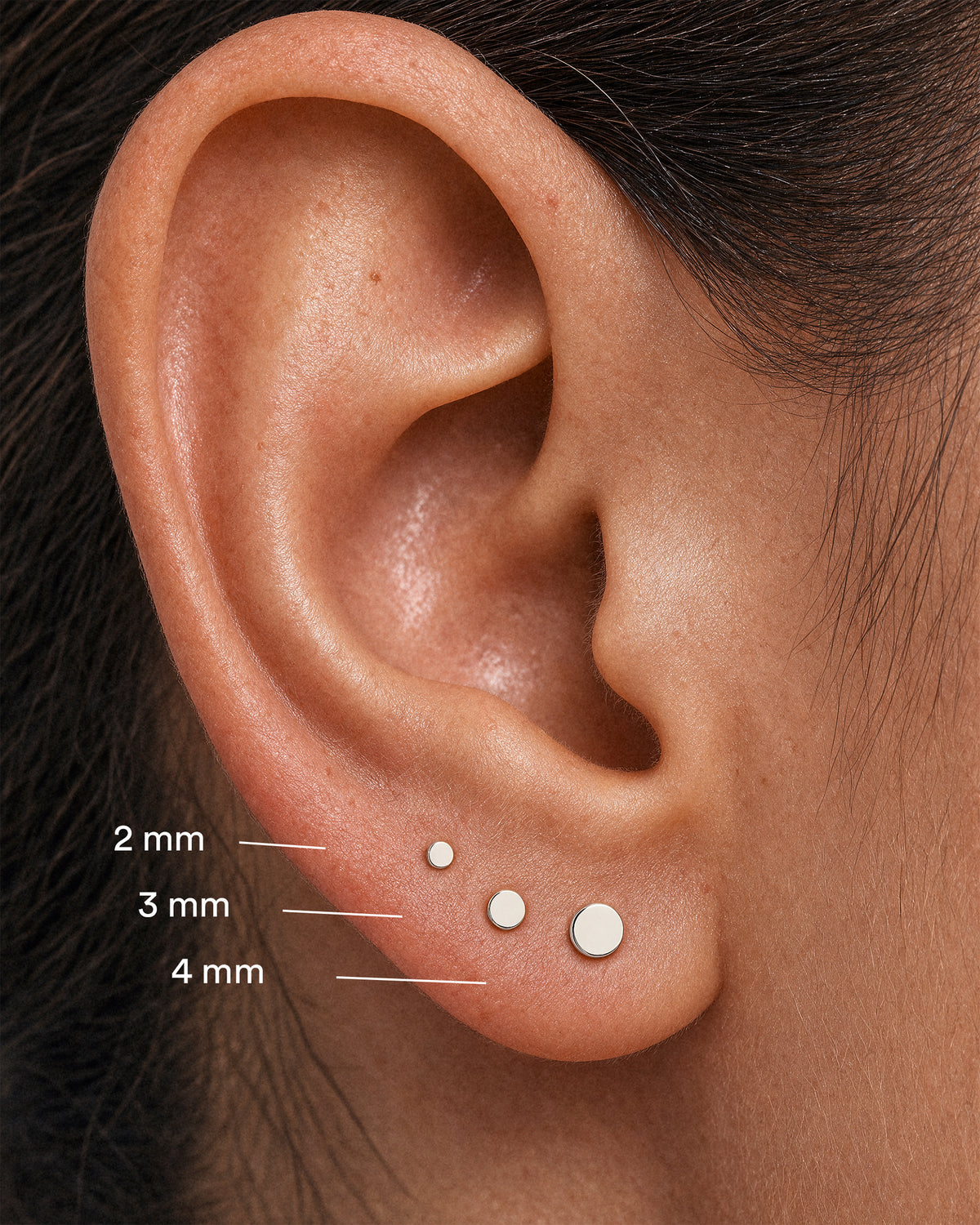 Tiny Triangle Studs in 925 Silver — alternate view of all sizes