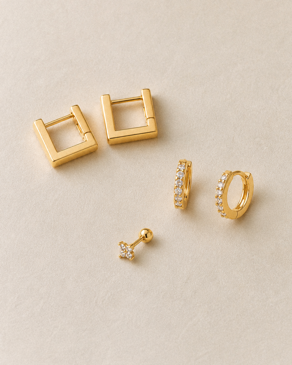 Earrings on a plain background