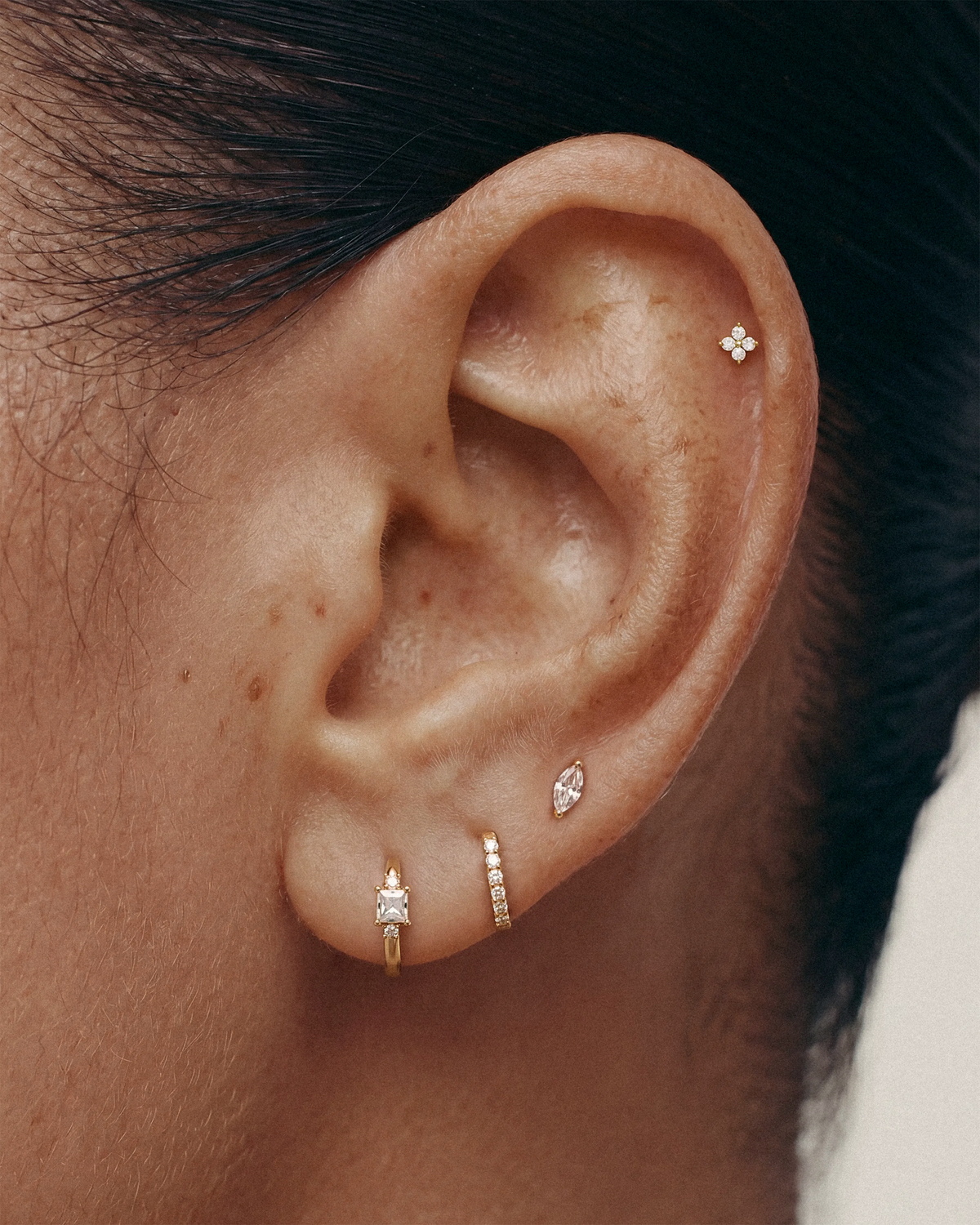 The original four-piece Emery ear stack in gold