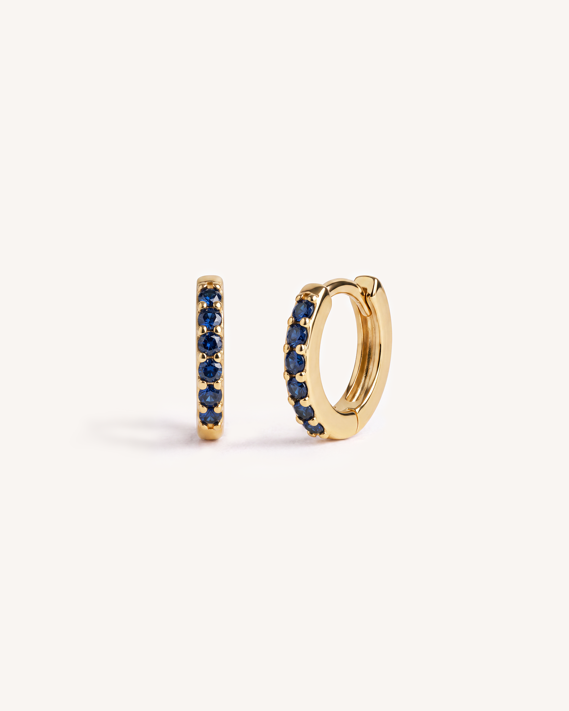 Mini Pave Huggie Hoops in Gold — Sapphire Blue