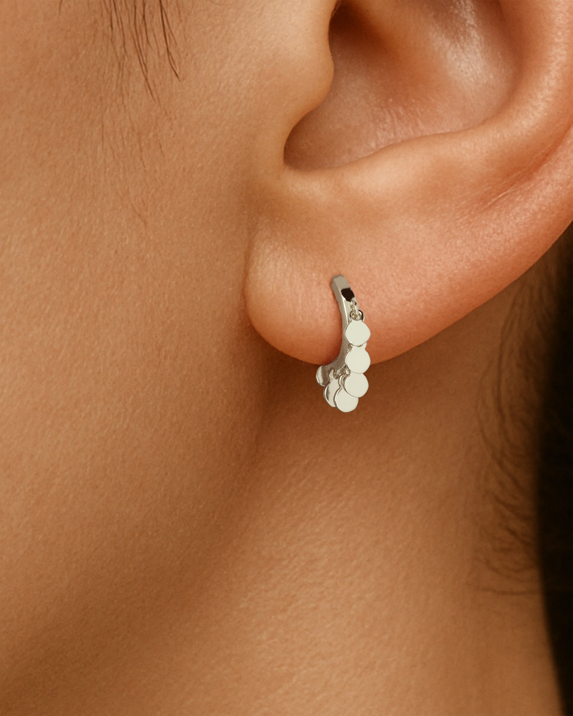 Mini Coin Huggie Hoops in Silver — alternate view