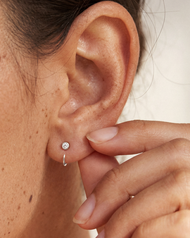 Open Solitaire Huggie Earrings