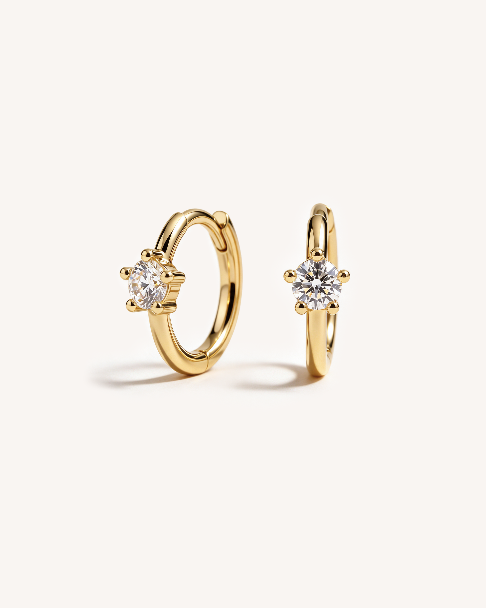 Solitaire Huggie Hoops in Gold