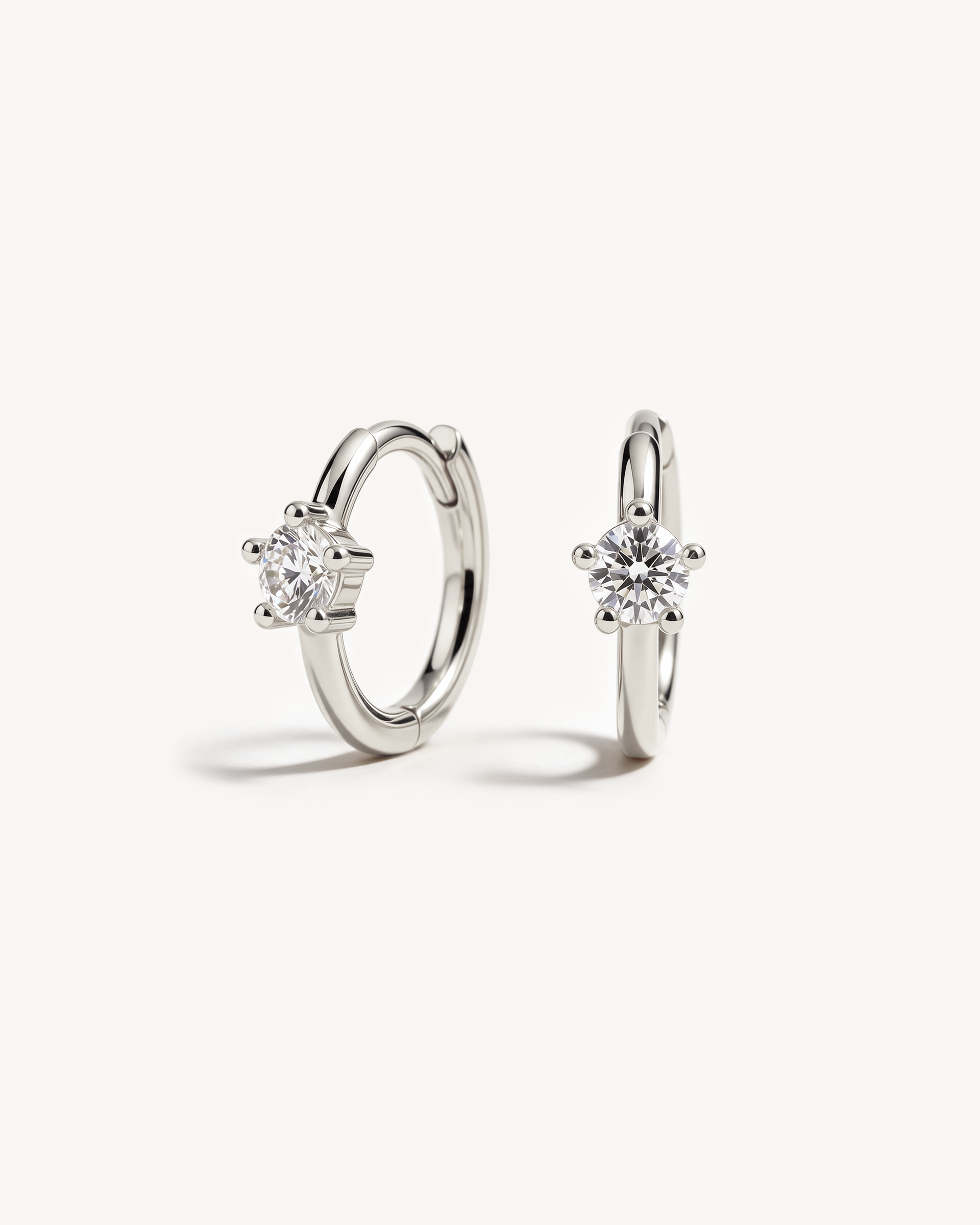 Solitaire Huggie Hoops in Silver