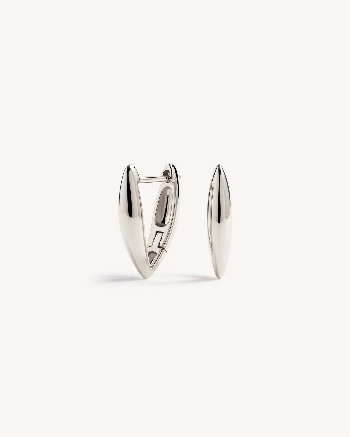 A pair of 925 sterling silver geometric V shaped hoops on a white background.