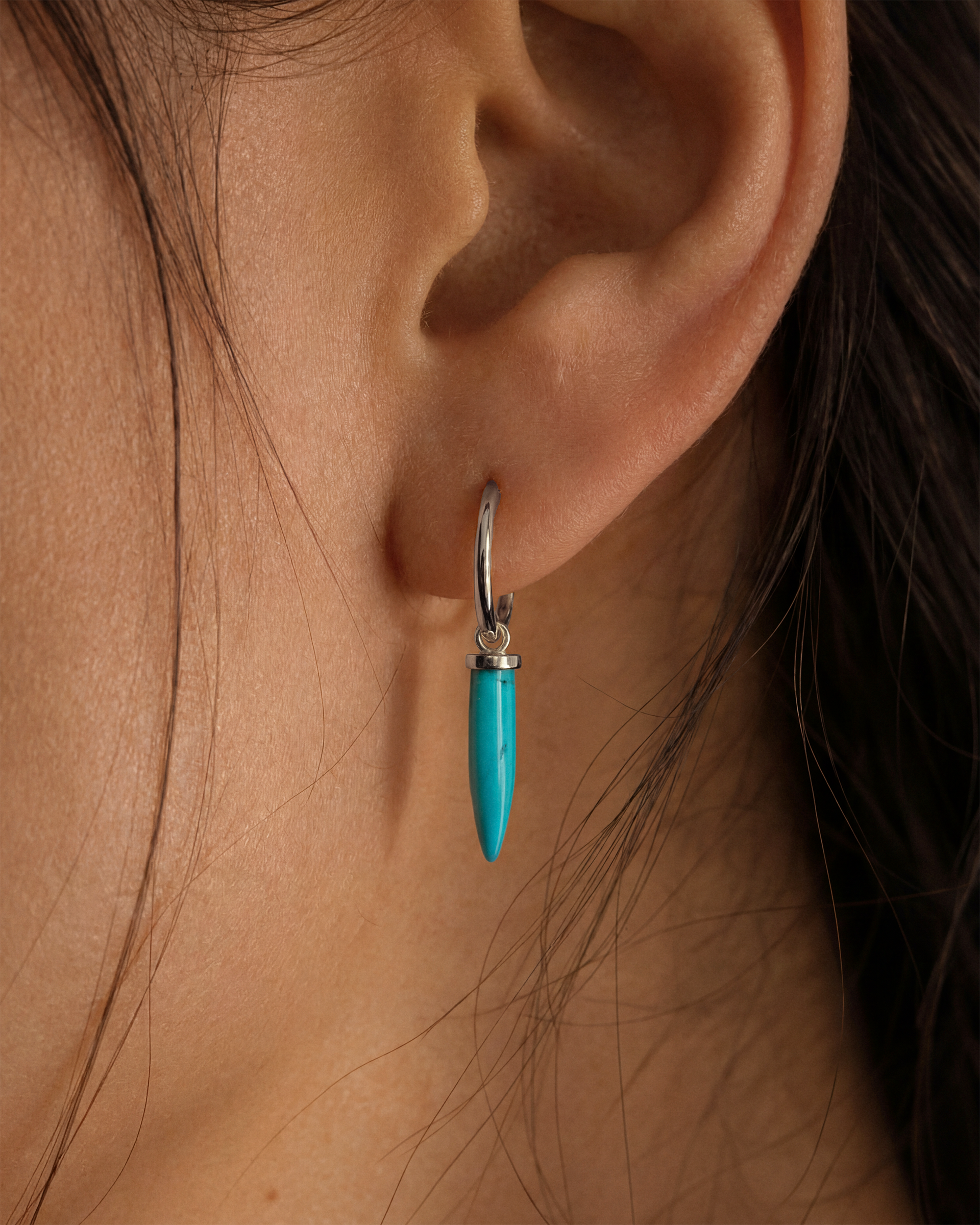 Turquoise Spike Huggie Hoops in Silver — alternate view