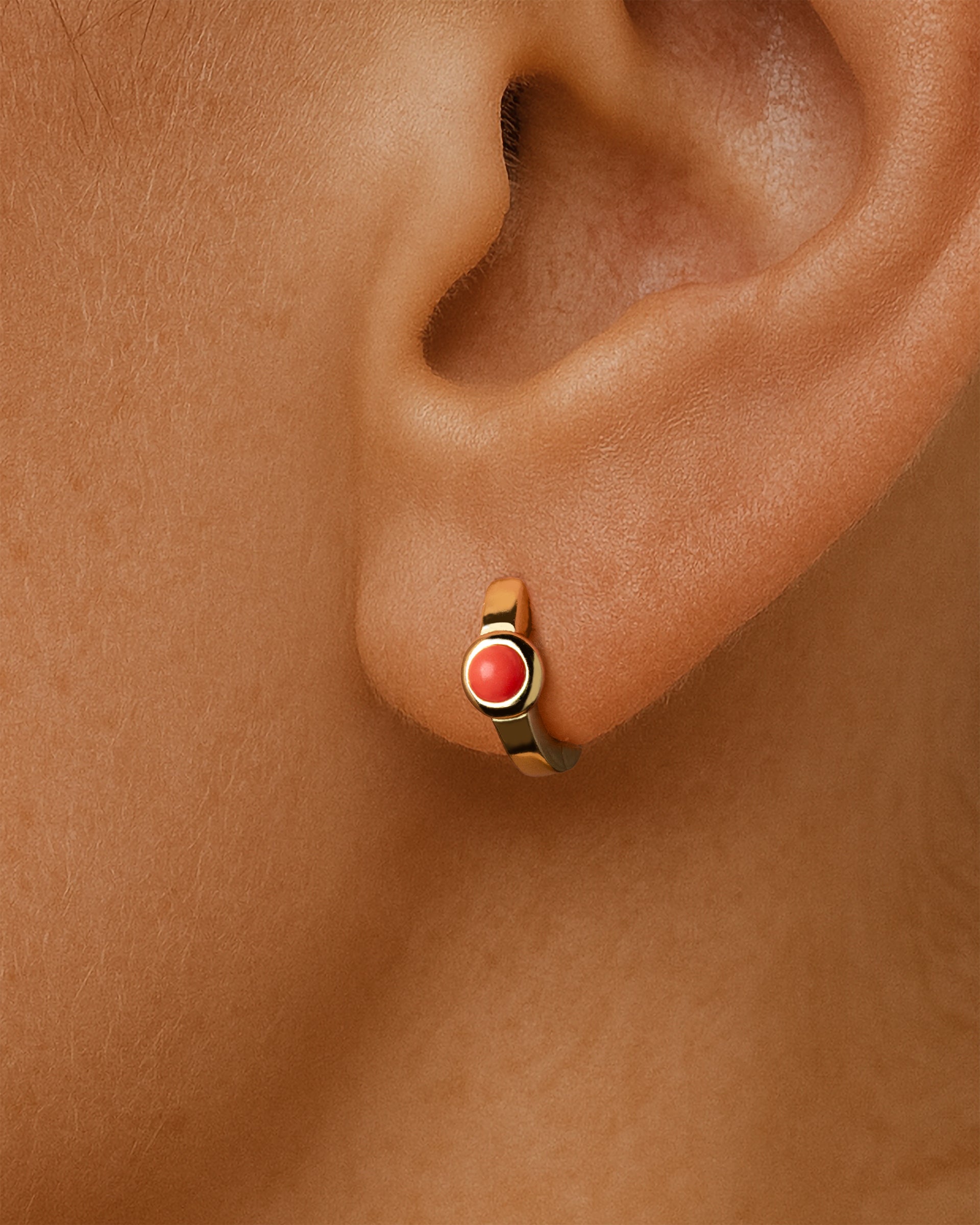 Coral Huggie Hoops in Gold — alternate view