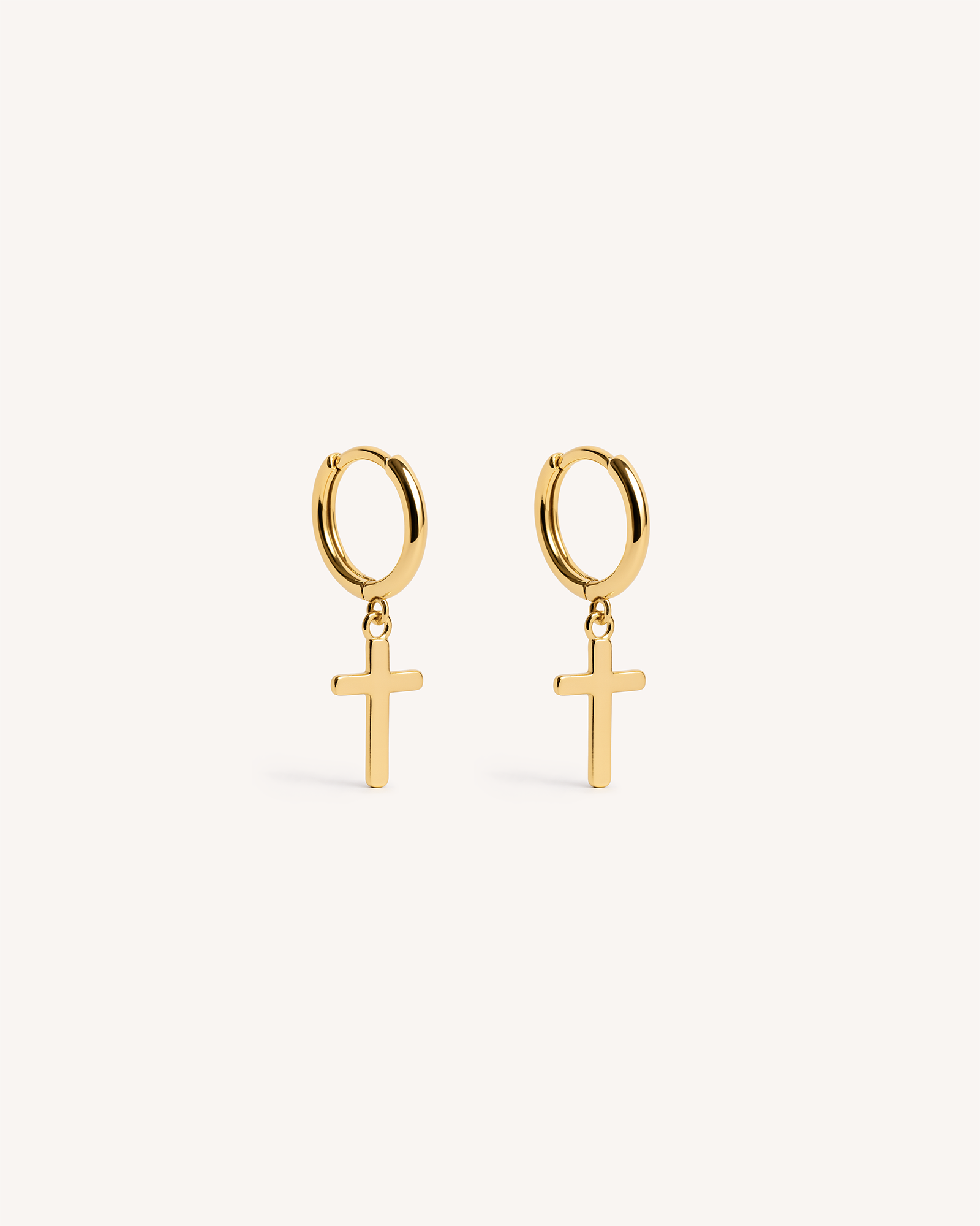 Cross Dangle Huggie Hoops in Gold