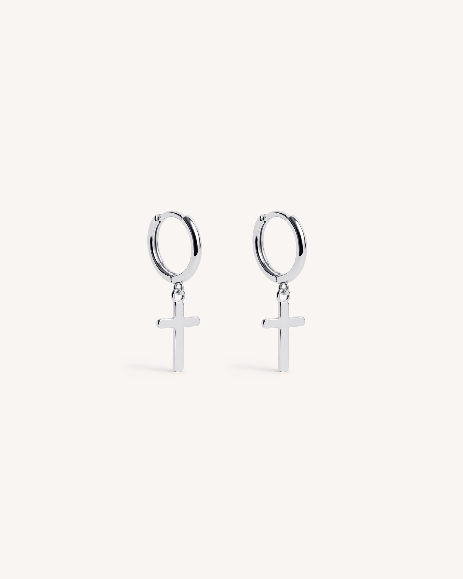 Cross Dangle Huggie Hoops in Silver