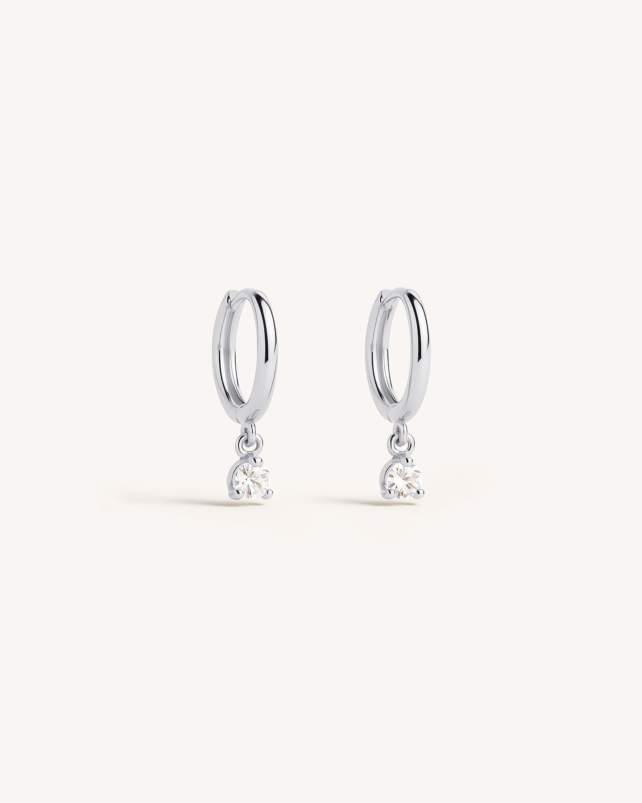 Solitaire Dangle Huggie Hoops in Silver