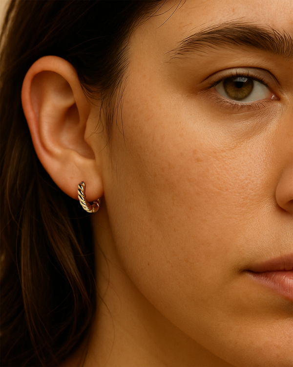 Thick braid hoops in gold