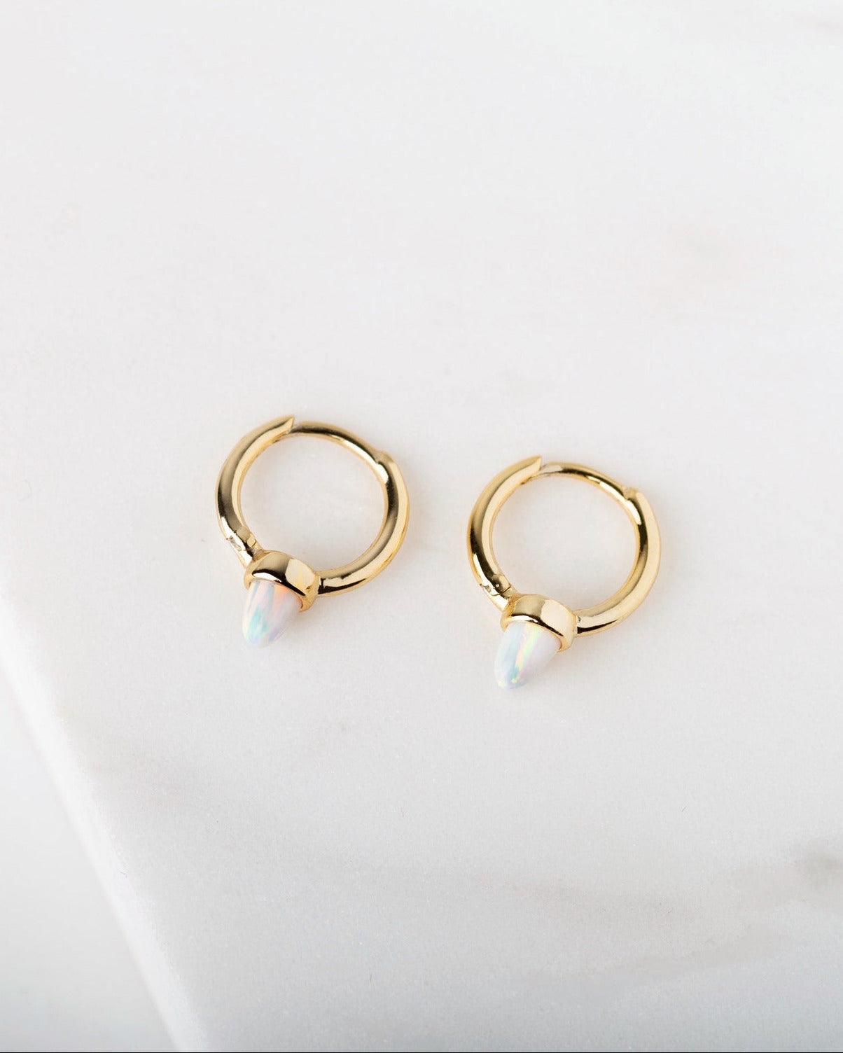 Opal Spike Huggie Hoops in Gold — alternate view