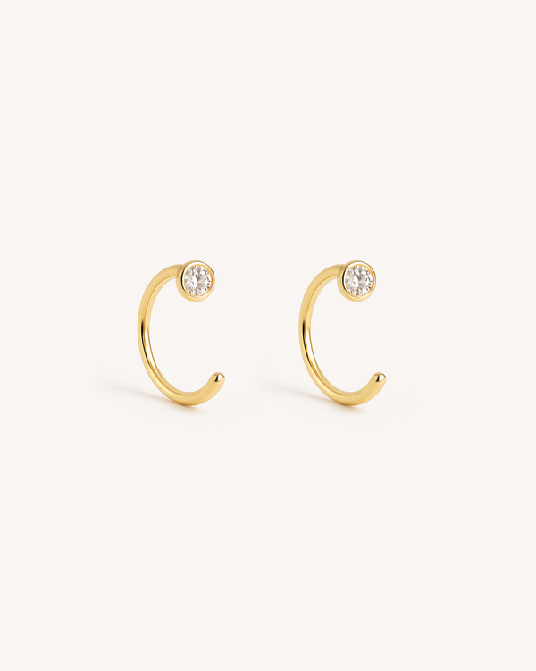 Open Solitaire Huggie Earrings