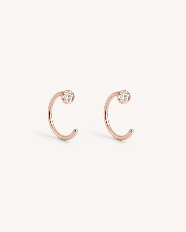 Open Solitaire Huggie Earrings