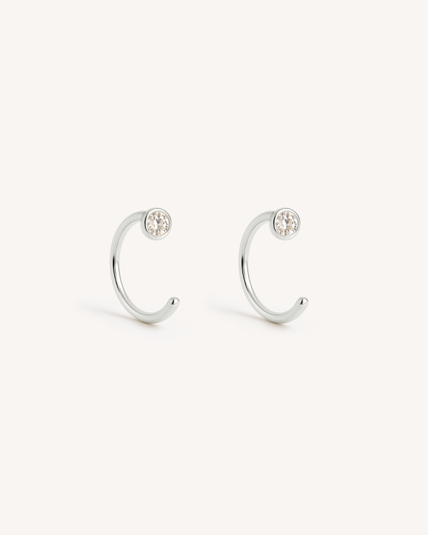 Open Solitaire Huggie Earrings
