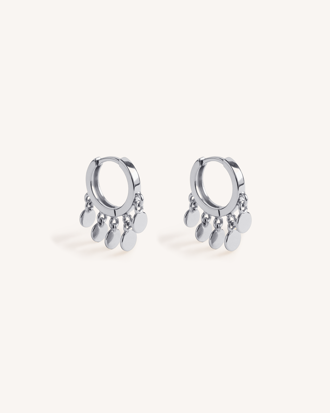 Mini Coin Huggie Hoops in Silver