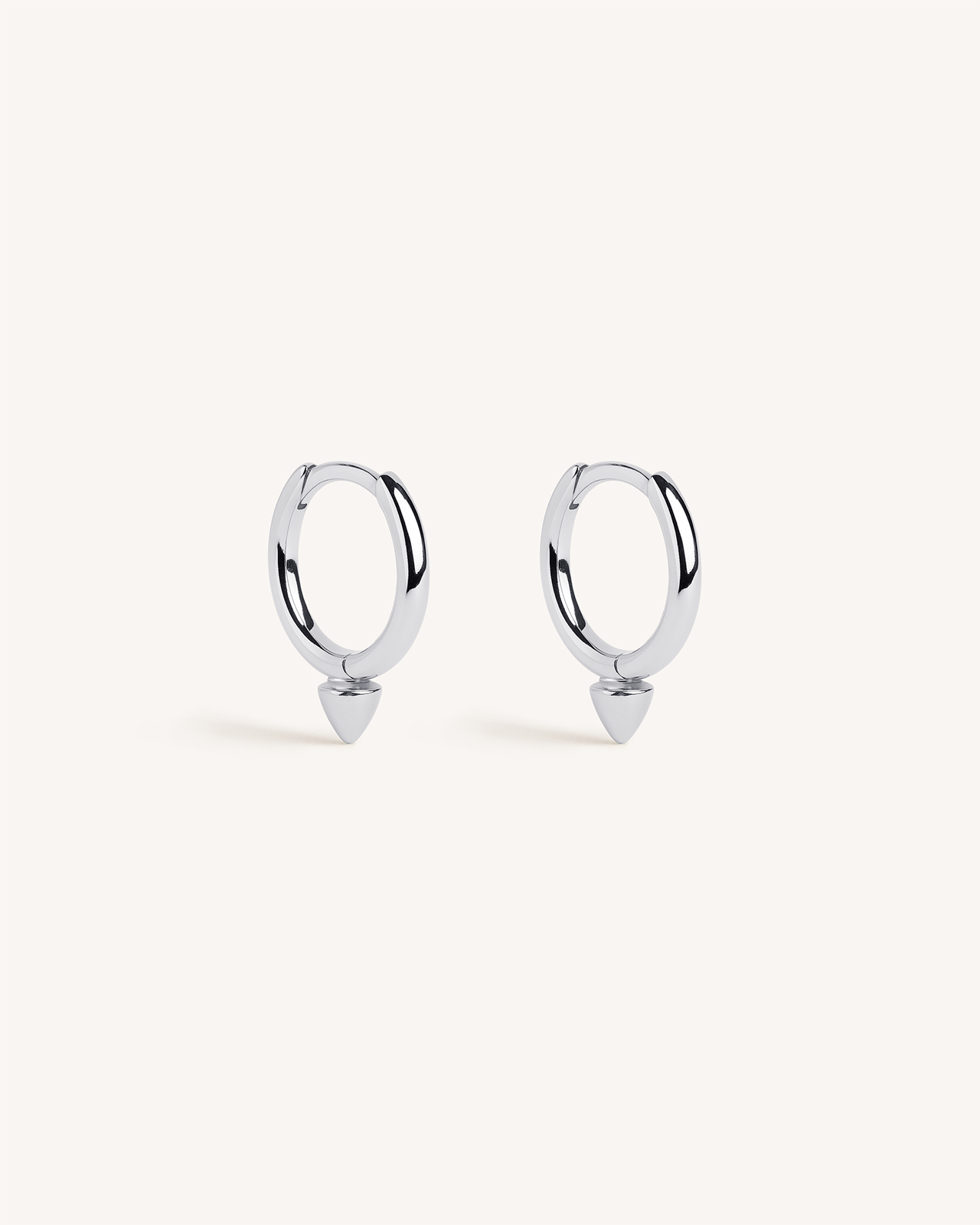 Mini Spike Huggie Hoops in Silver
