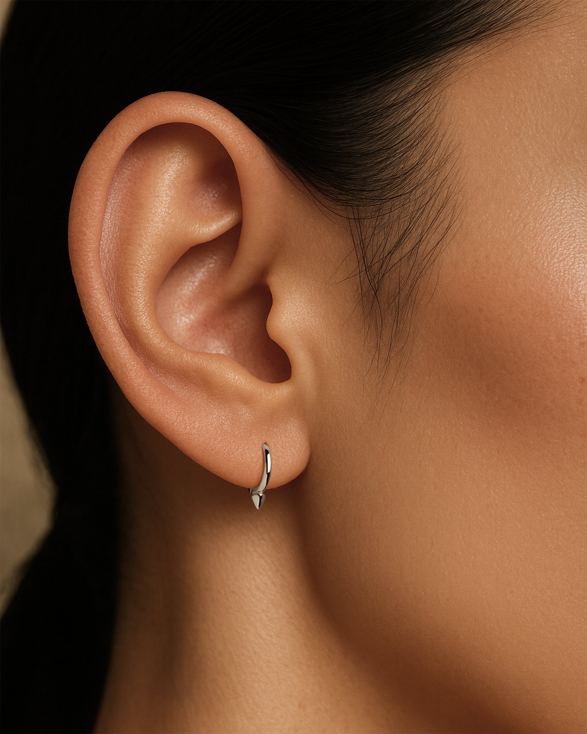 Mini Spike Huggie Hoops in Silver — alternate view