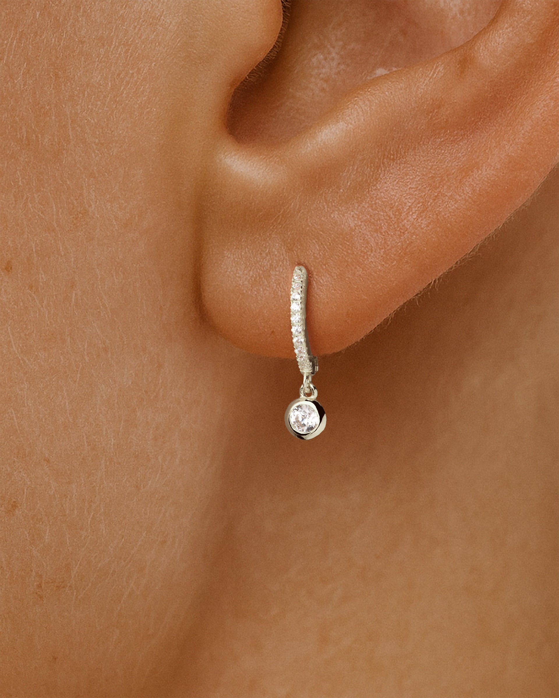 Solitaire Pave Dangle Huggie Hoops in Silver — alternate view