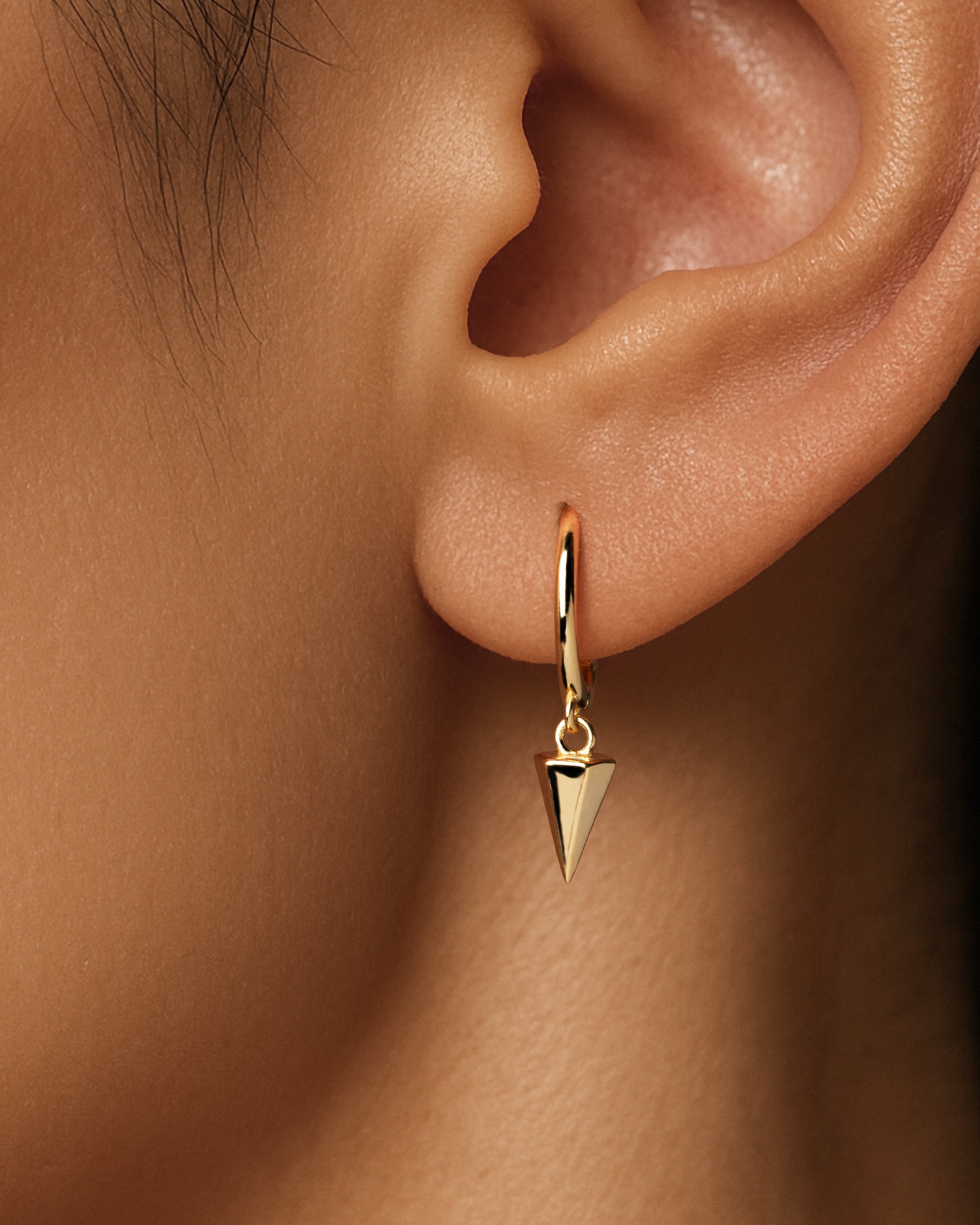 Pyramid Dangle Huggie Hoops in Gold — alternate view