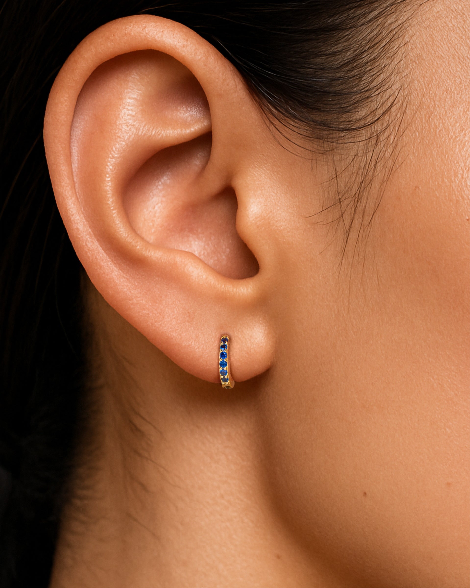 Mini Pave Huggie Hoops in Gold — Sapphire — alternate view