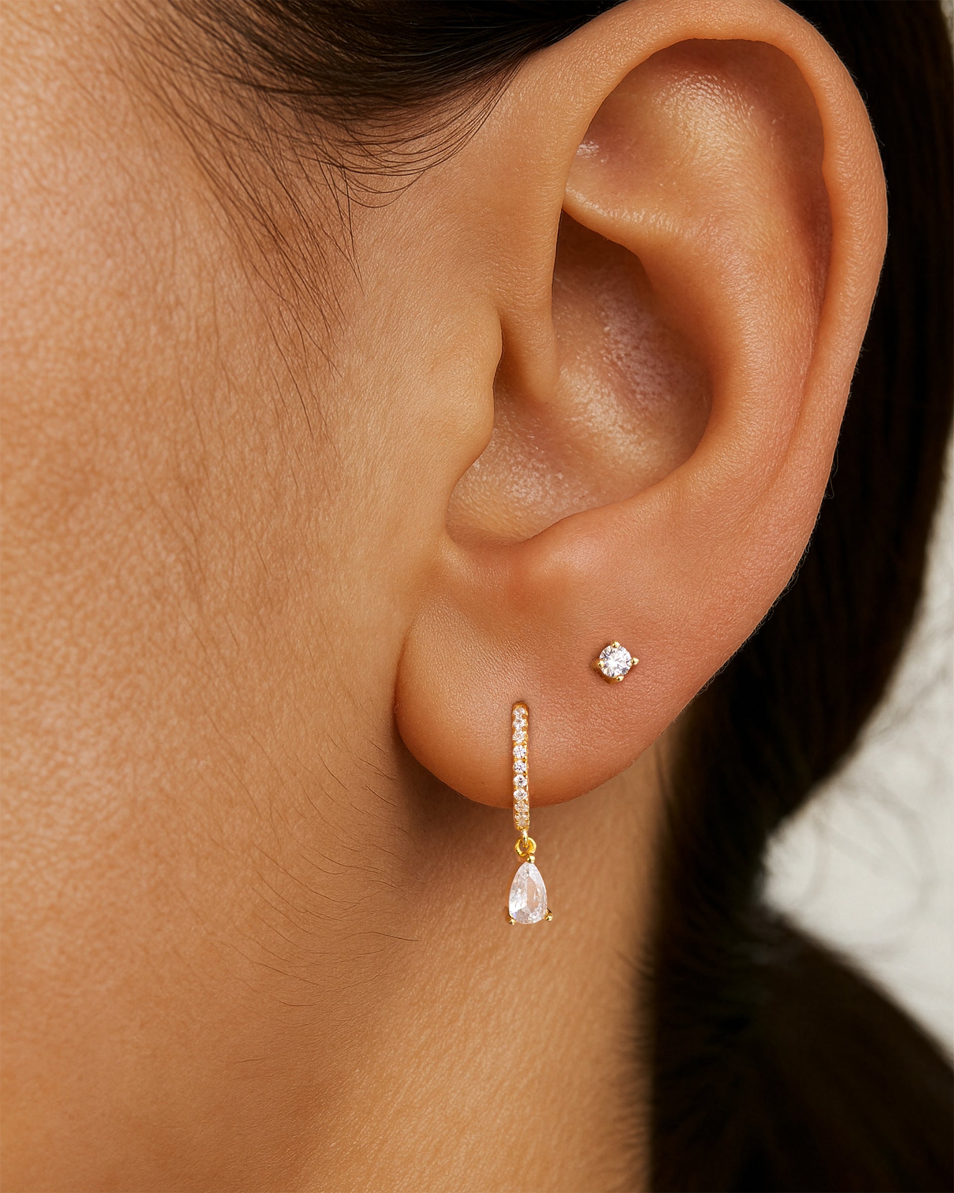 Teardrop Pave Dangle Huggie Hoops in Gold — alternate view
