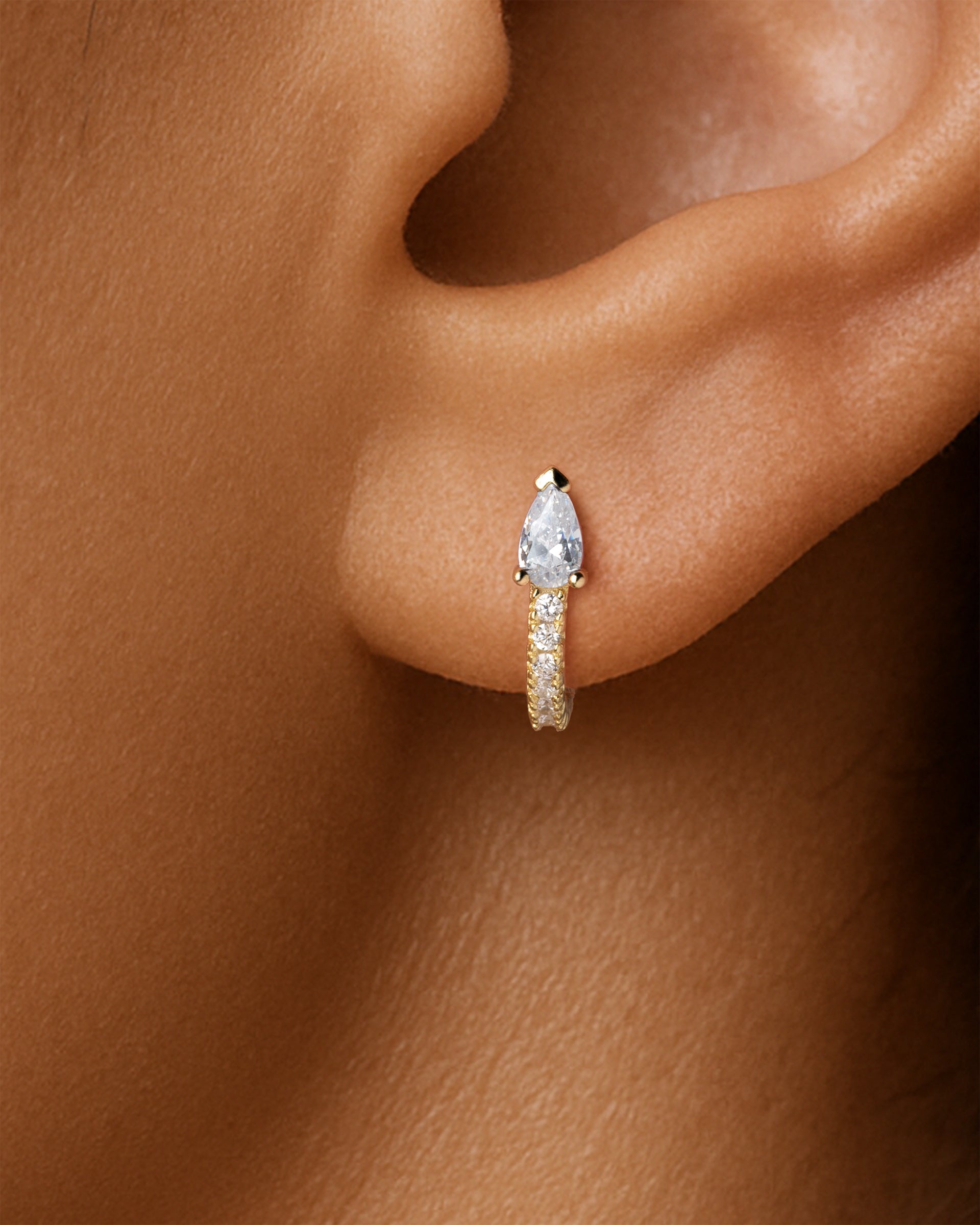 Teardrop Pave Huggie Hoops in Gold — Crystal — alternate view