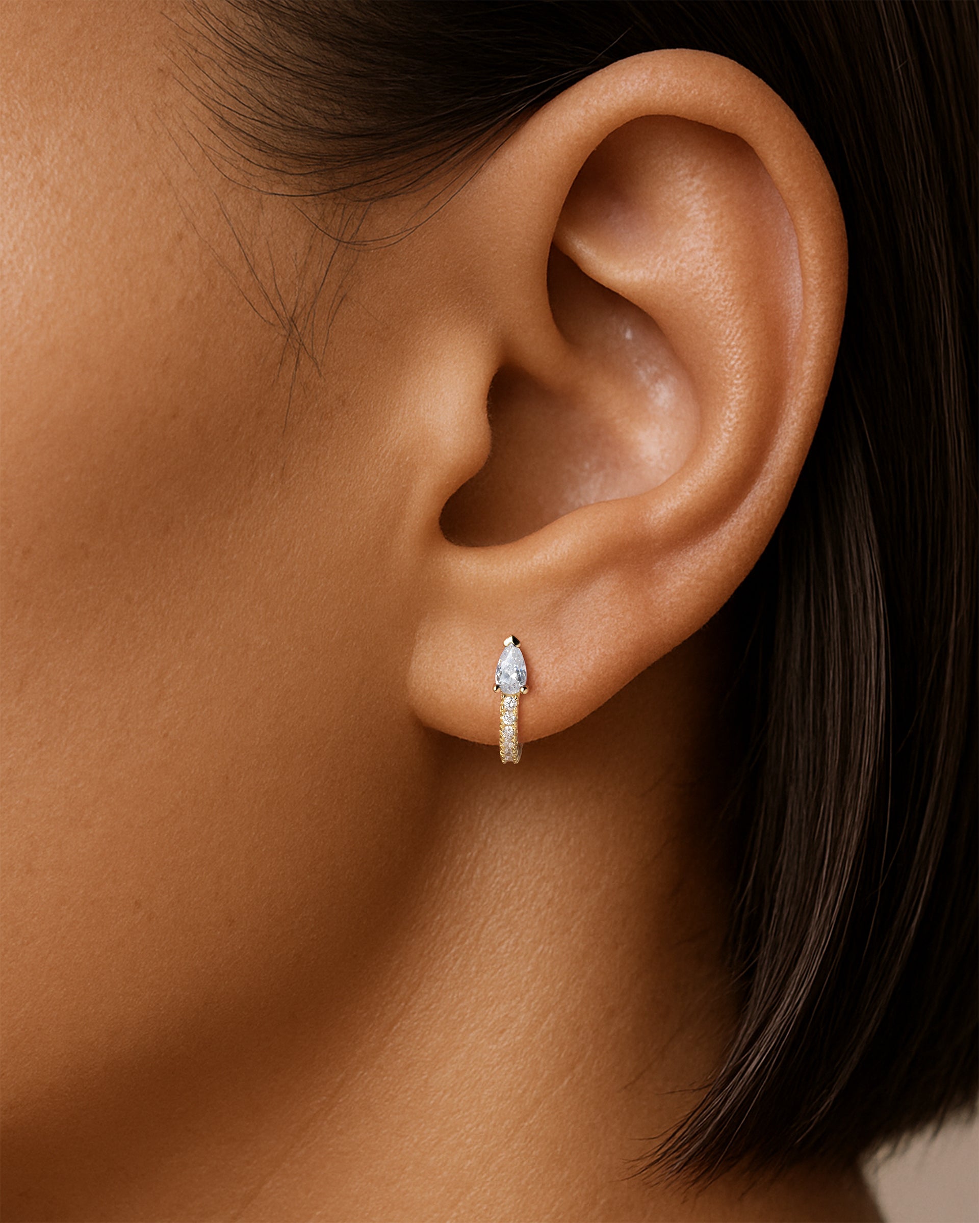 Teardrop Pave Huggie Hoops in Gold — Crystal — alternate view