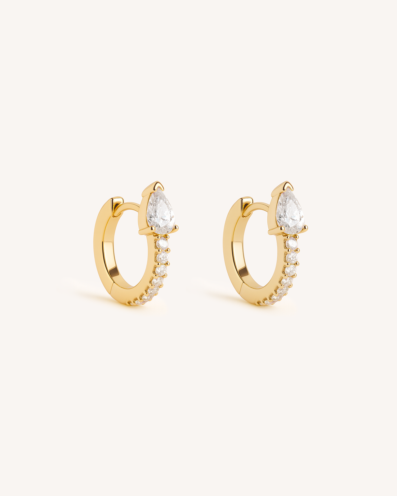 Teardrop Pave Huggie Hoops in Gold — Crystal