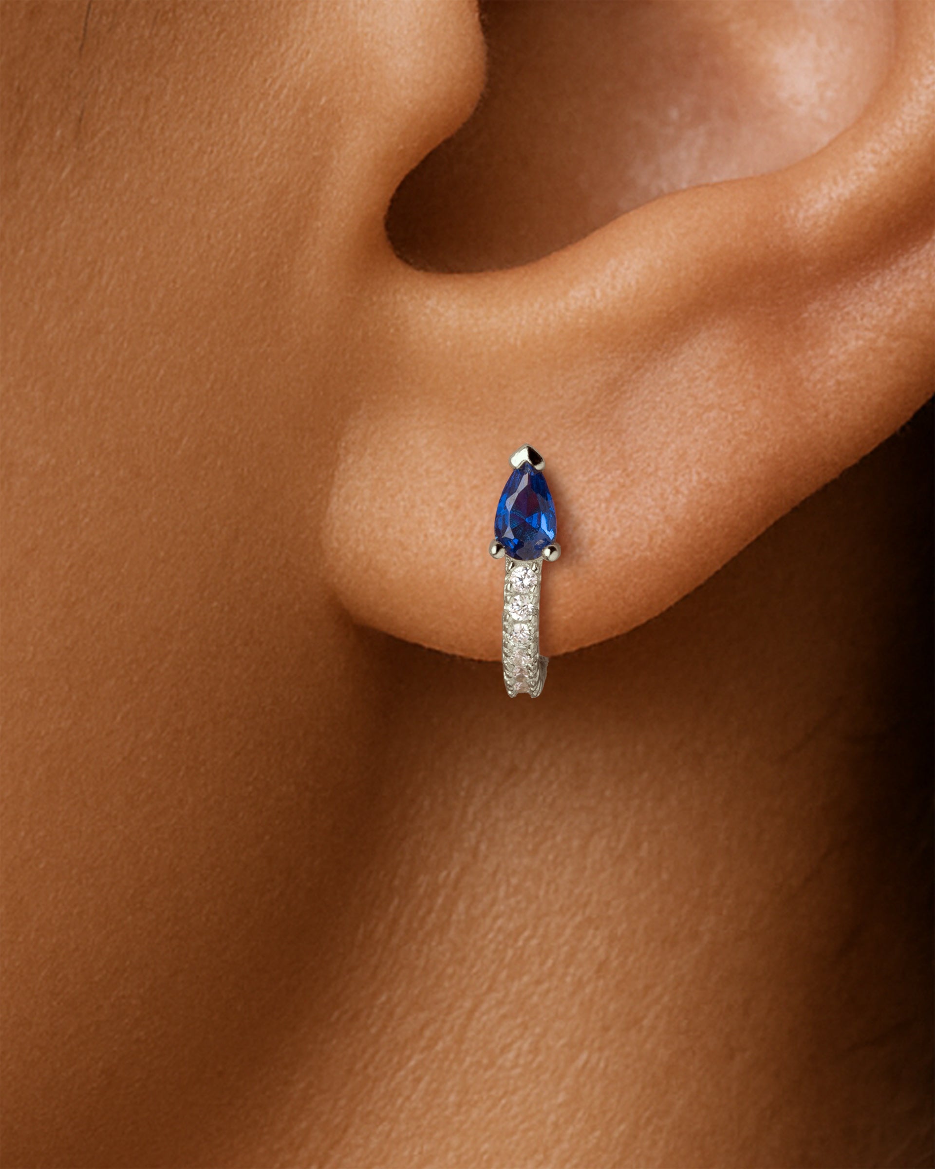 Teardrop Pave Huggie Hoops in Silver — Sapphire — alternate view