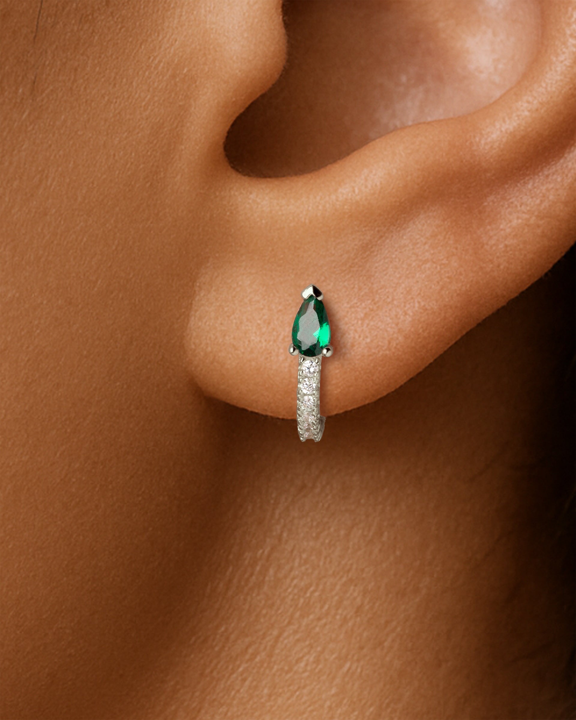 Teardrop Pave Huggie Hoops in Silver — Emerald — alternate view
