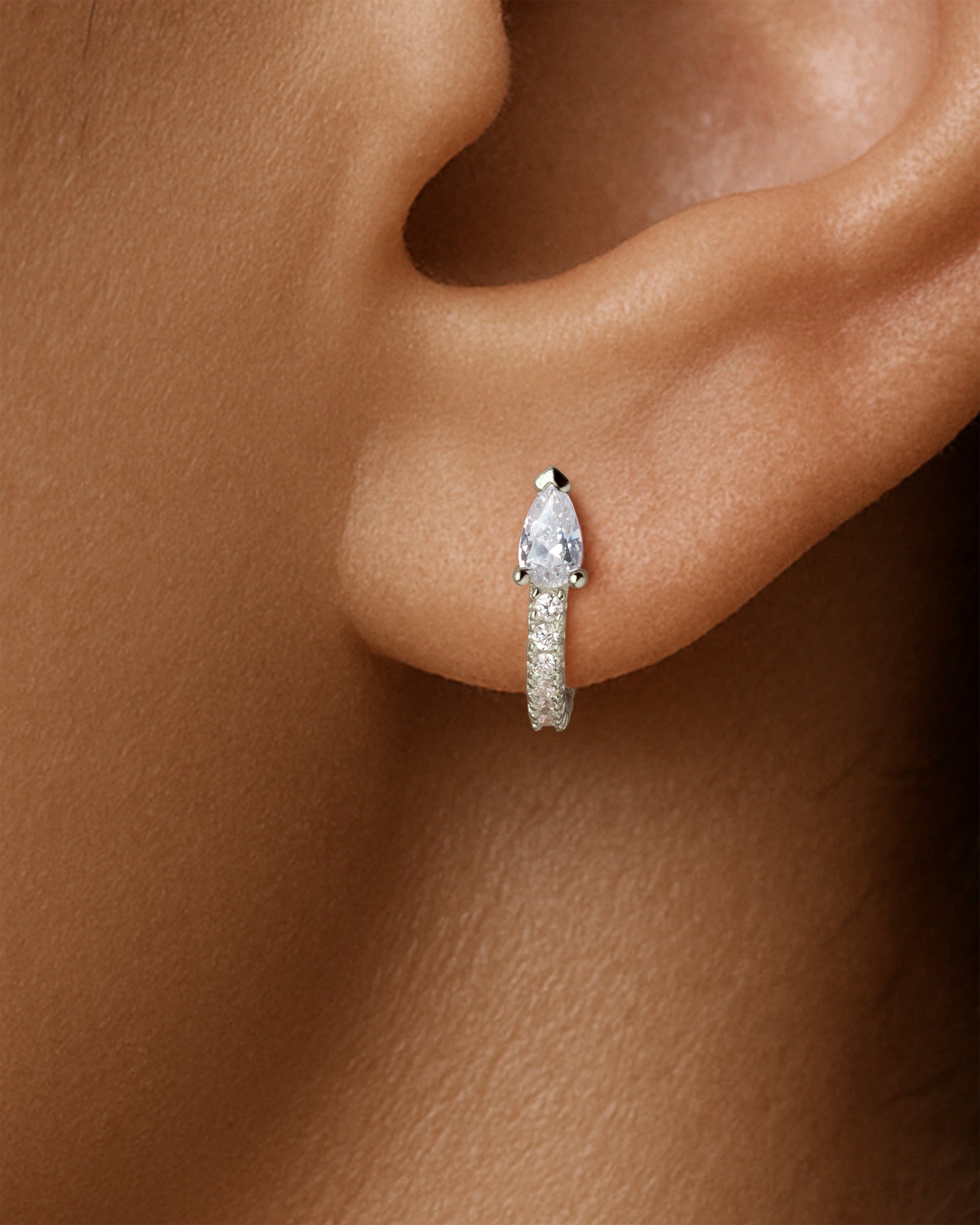 Teardrop Pave Huggie Hoops in Silver — Crystal — alternate view