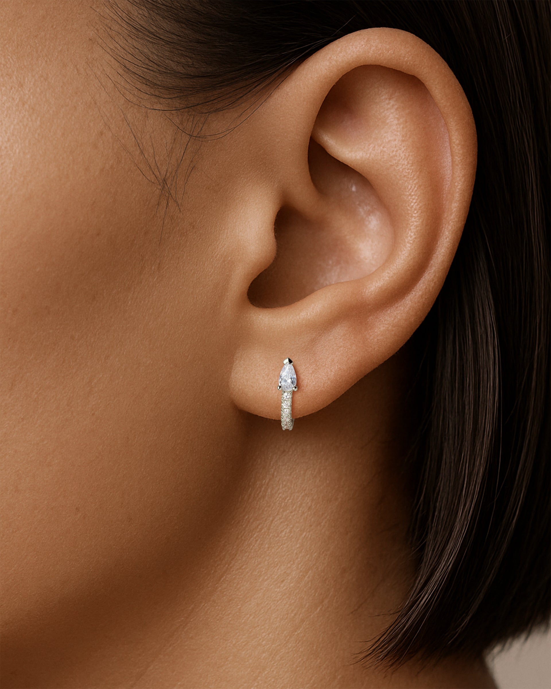 Teardrop Pave Huggie Hoops in Silver — Crystal — alternate view