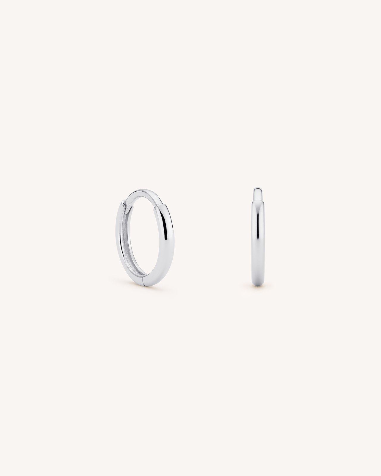 Thin Huggie Hoops in Silver