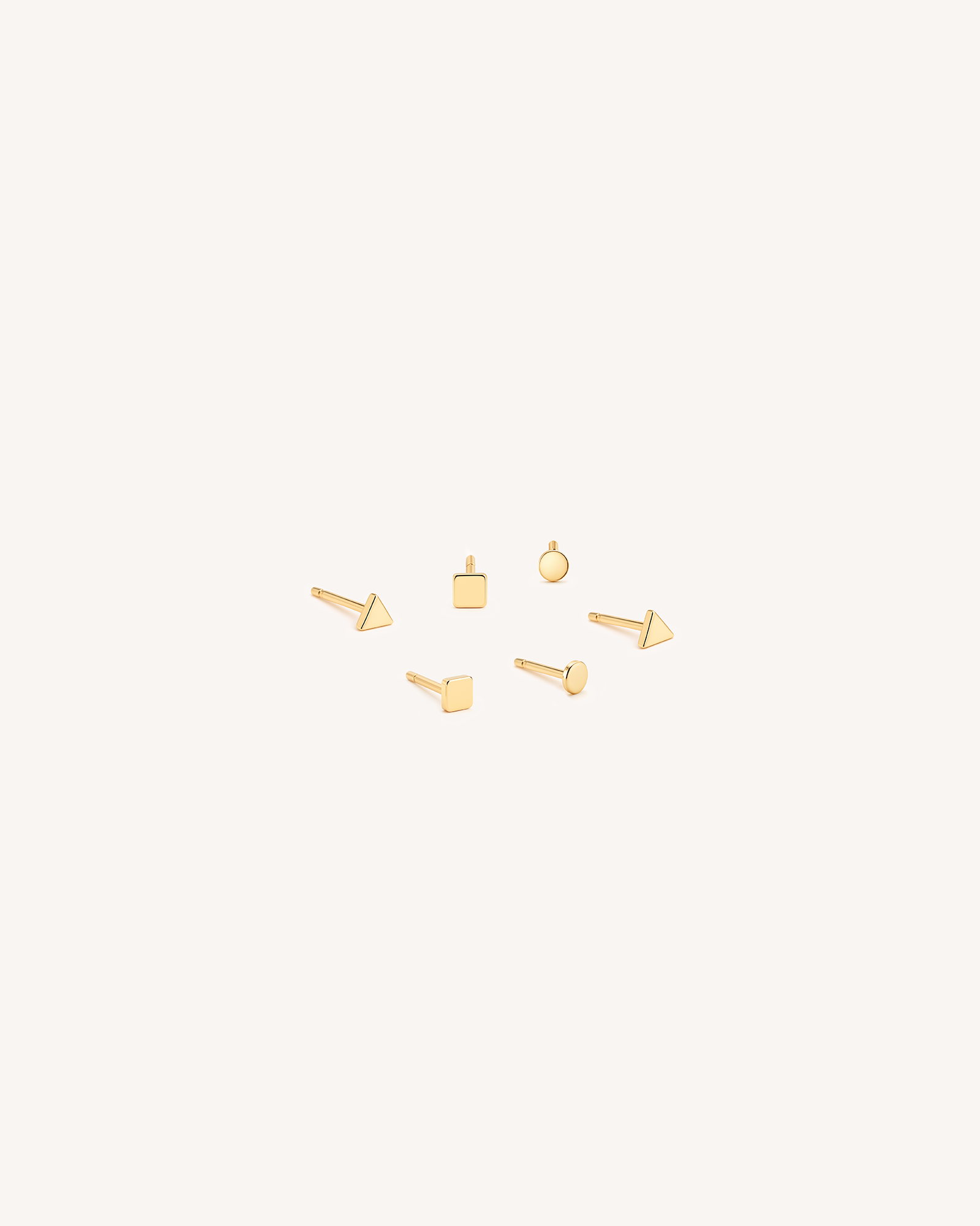 Tiny Triangle Studs in Gold — alternate view