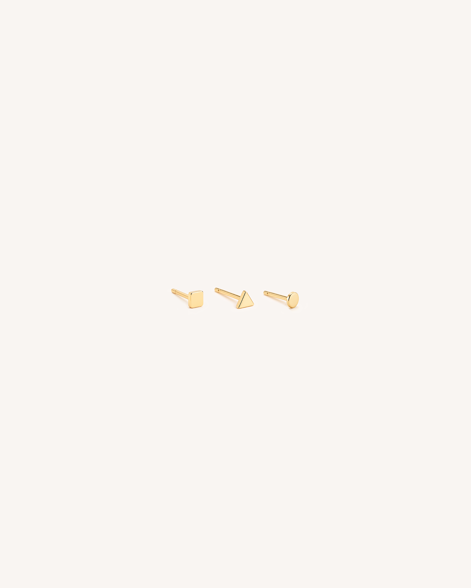 Tiny Triangle Studs in Gold — alternate view